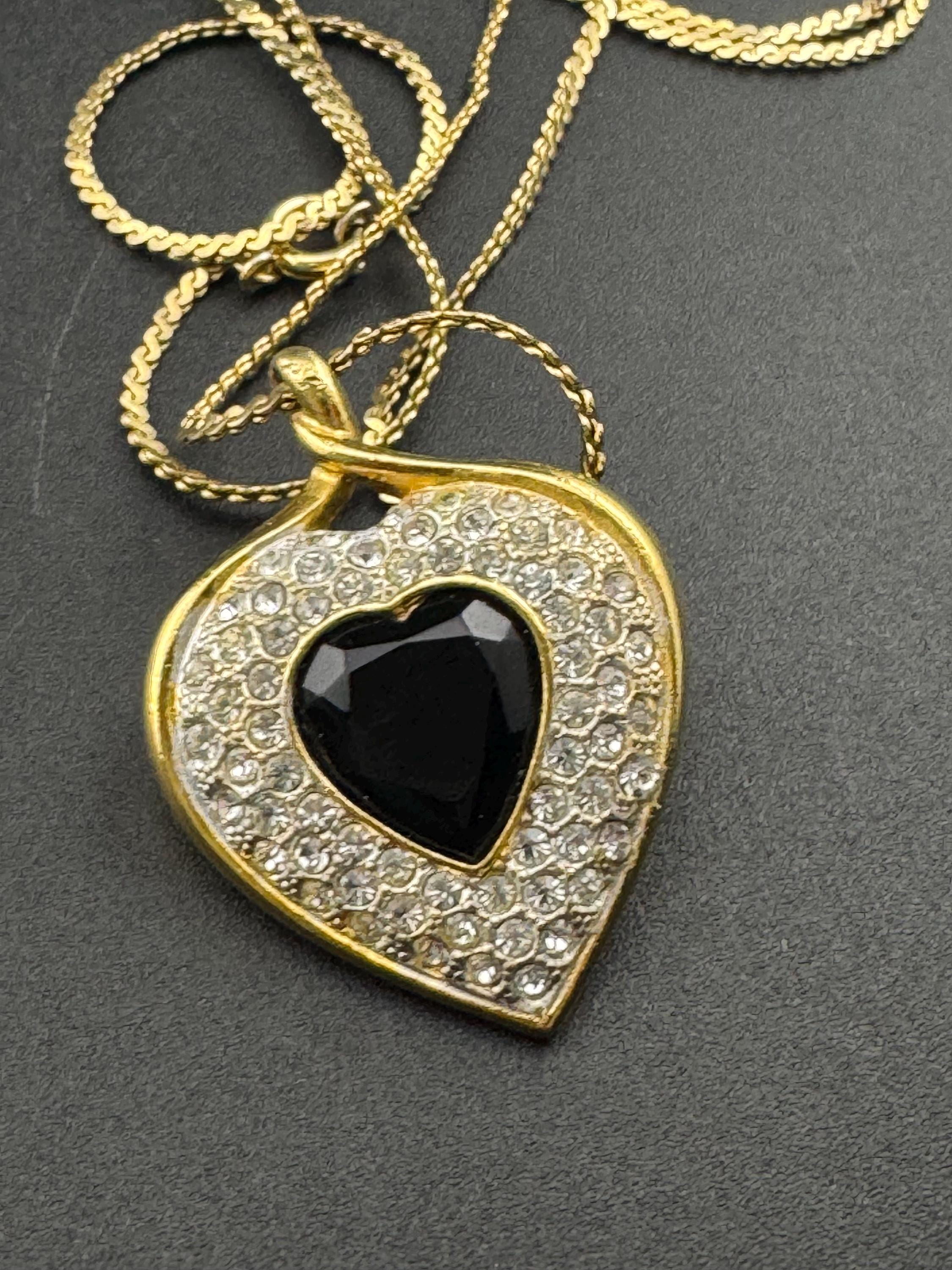 Signed Sphinx black glass crystal love heart diamanté pendant necklace on a long gold plated serpentine chain