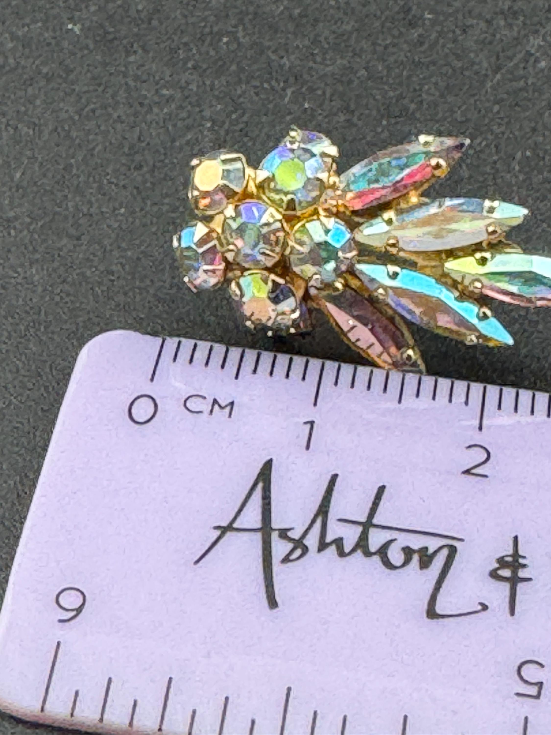 Signed Sherman vintage Clear AB aurora borealis glass rhinestone diamanté gold tone Clip on leaf earrings