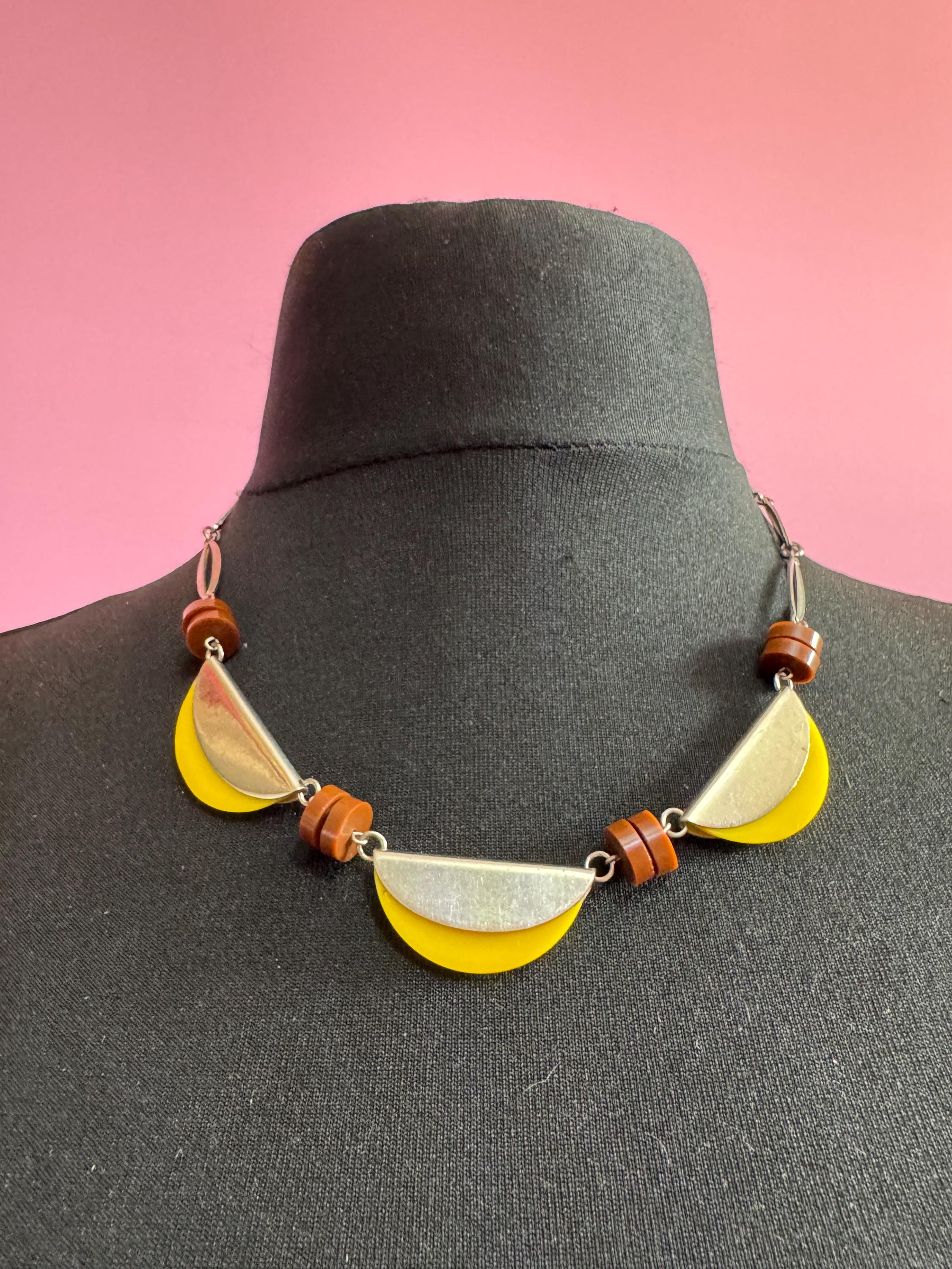 Art deco Jakob Bengel modernist Chrome silver tone metal 1920s brown and yellow galalith plastic semicircle beaded geometric bead necklace