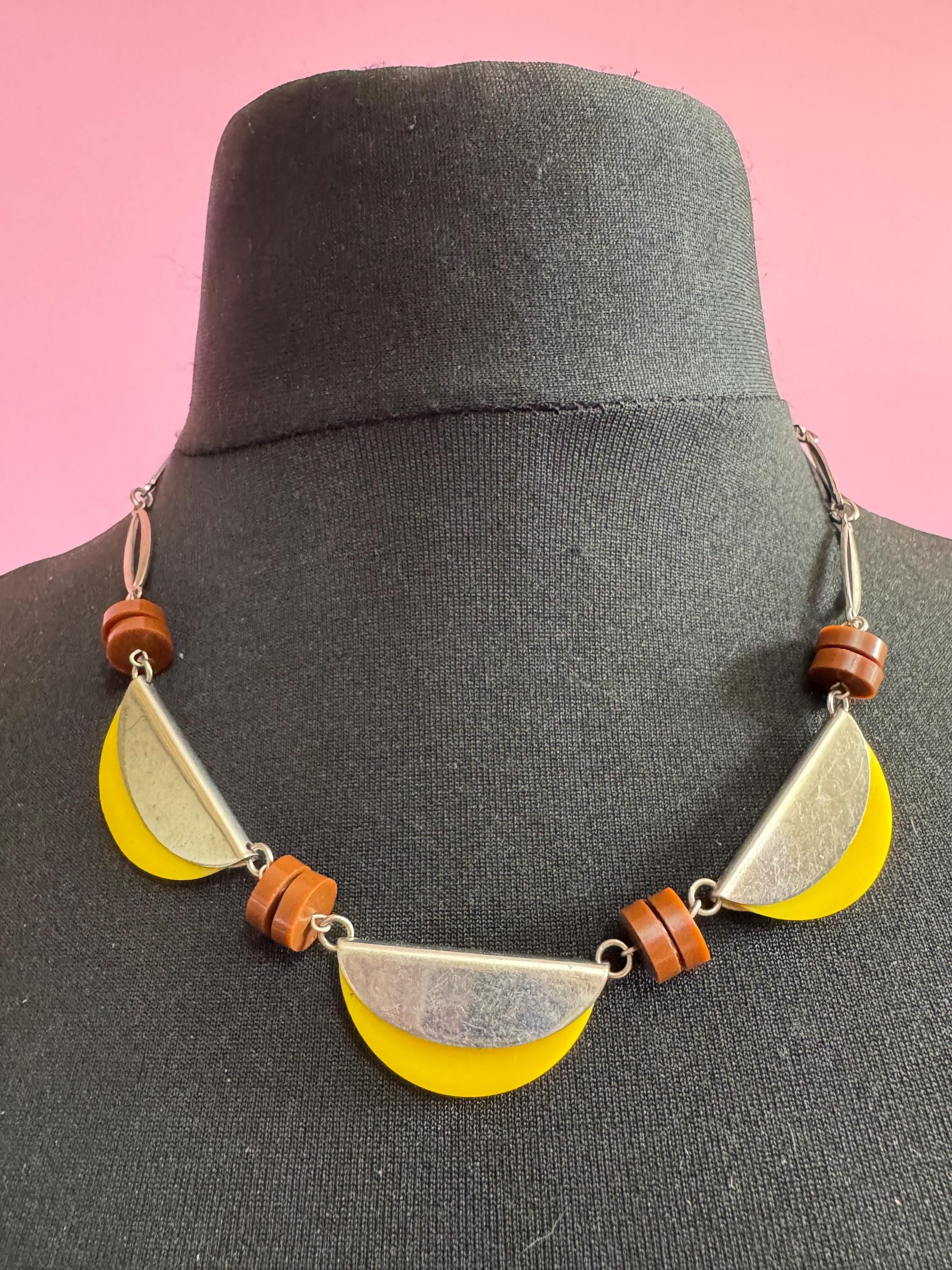 Art deco Jakob Bengel modernist Chrome silver tone metal 1920s brown and yellow galalith plastic semicircle beaded geometric bead necklace