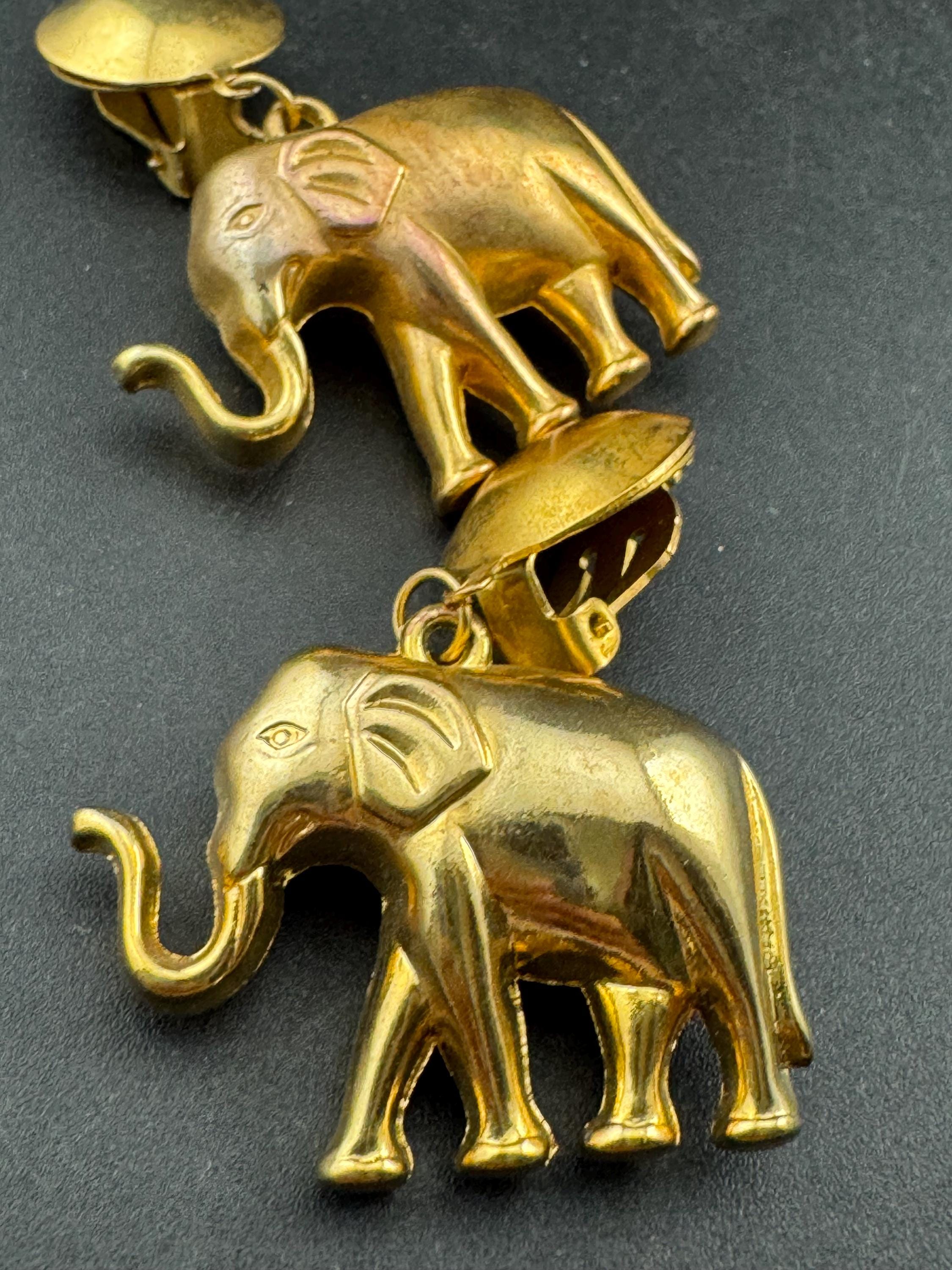 Vintage designer style oversized dangly elephant drop clip on earrings gold tone