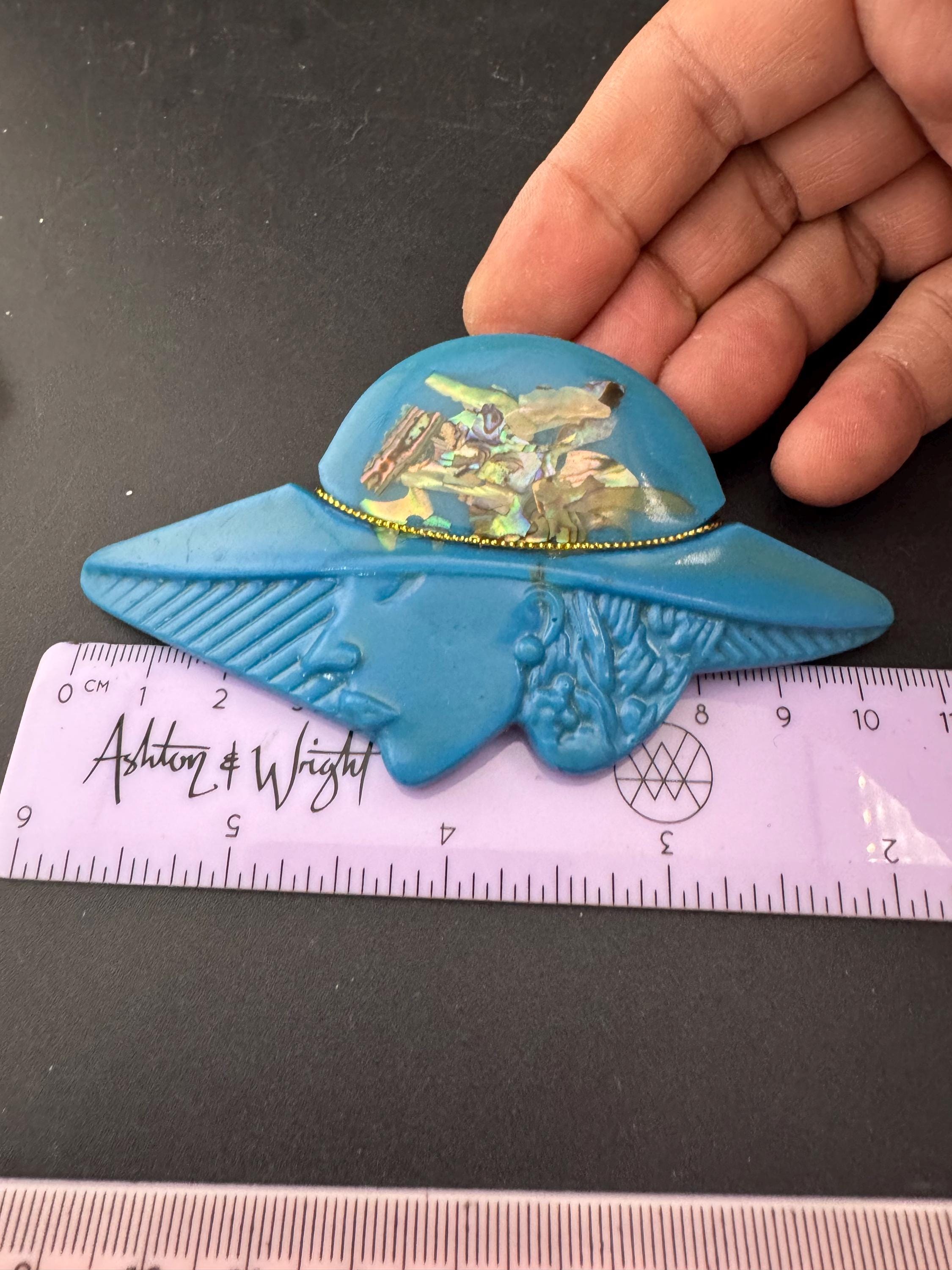 Oversized vintage lady in wide brimmed hat blue brooch inset with abalone shell, early plastic 1960s