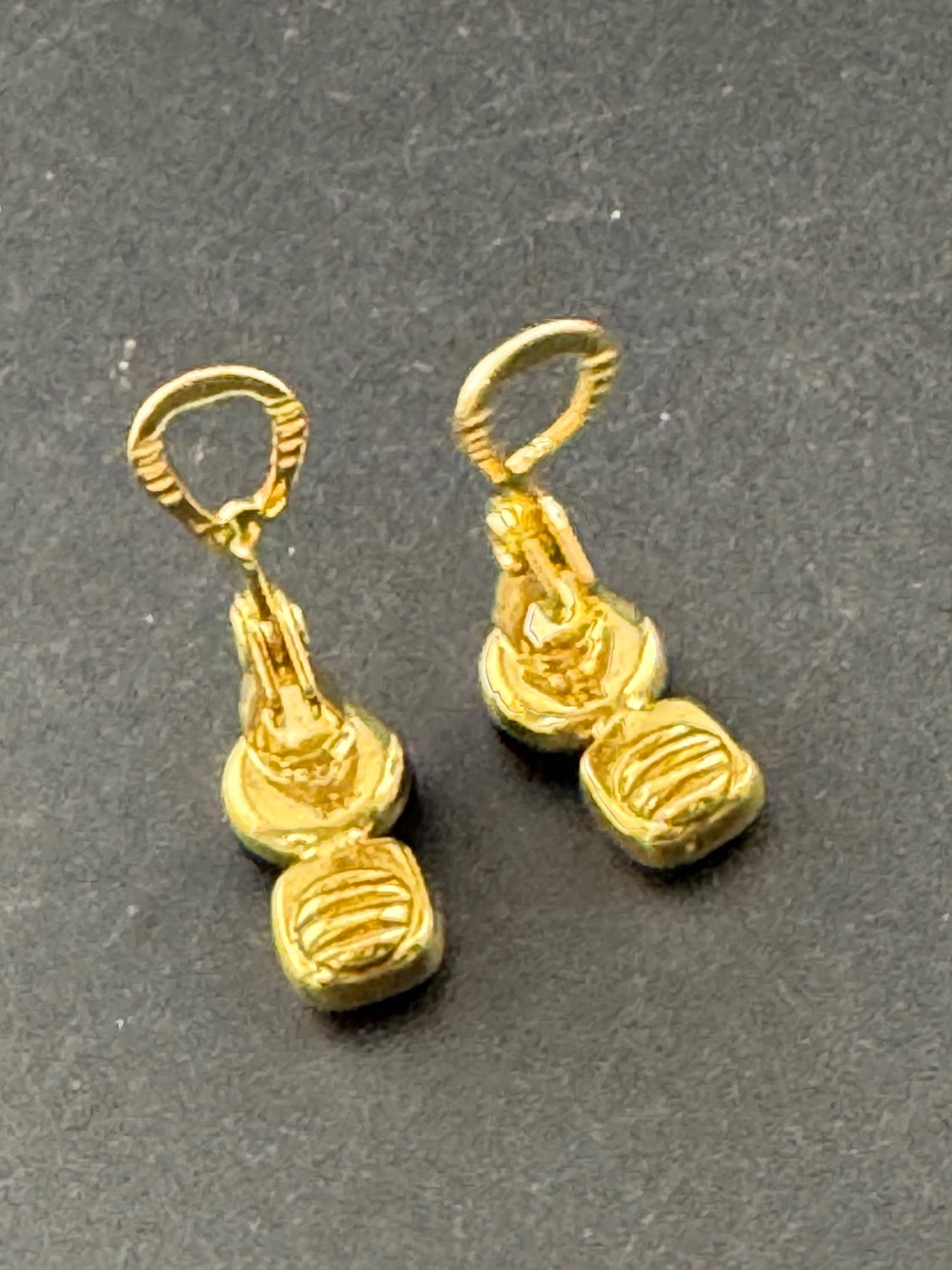 Signed MONET Gold tone black cabochon clip on earrings