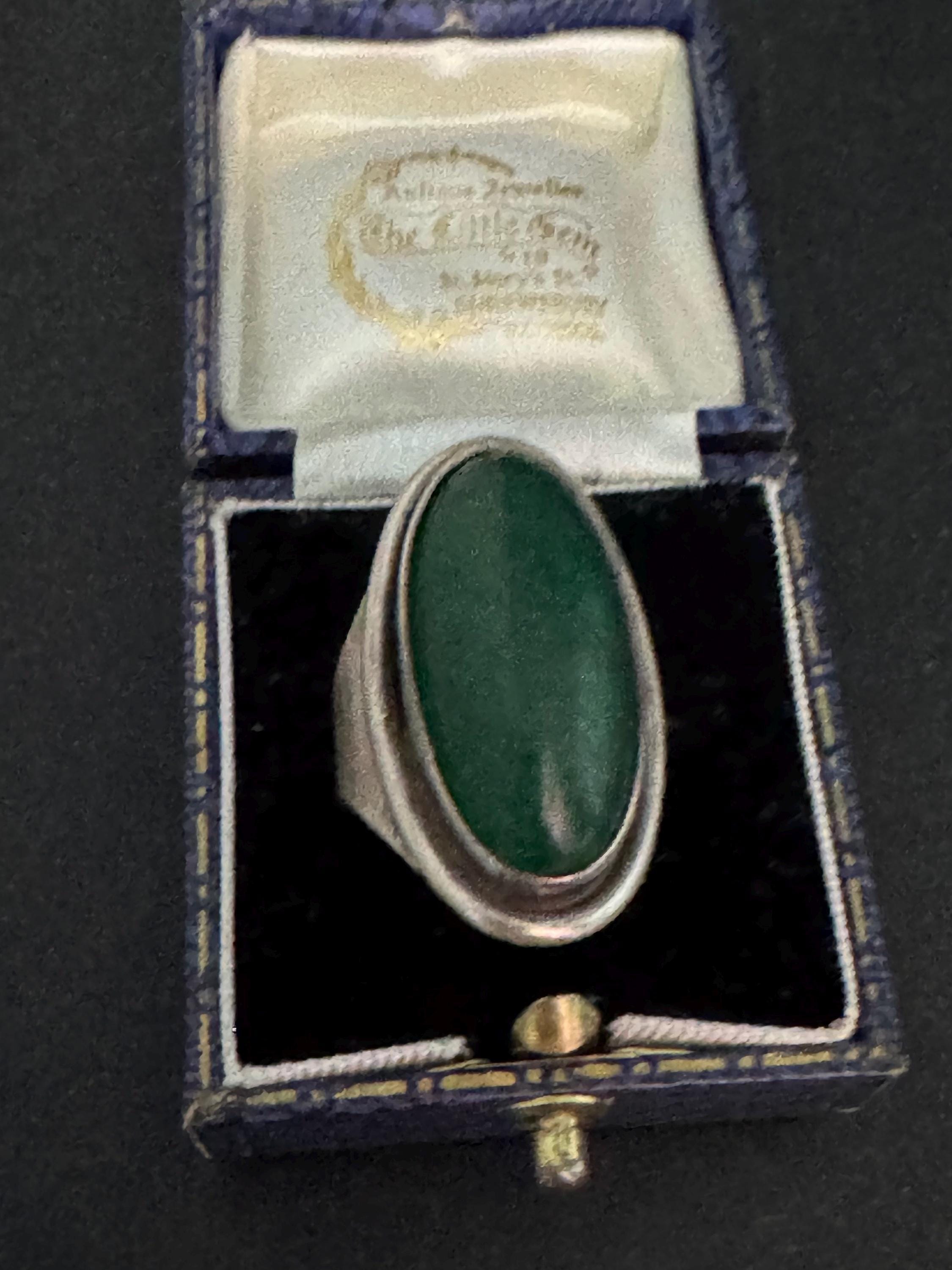 Uk Size K.5 modernist 925 Sterling silver ring with green oval gemstone,