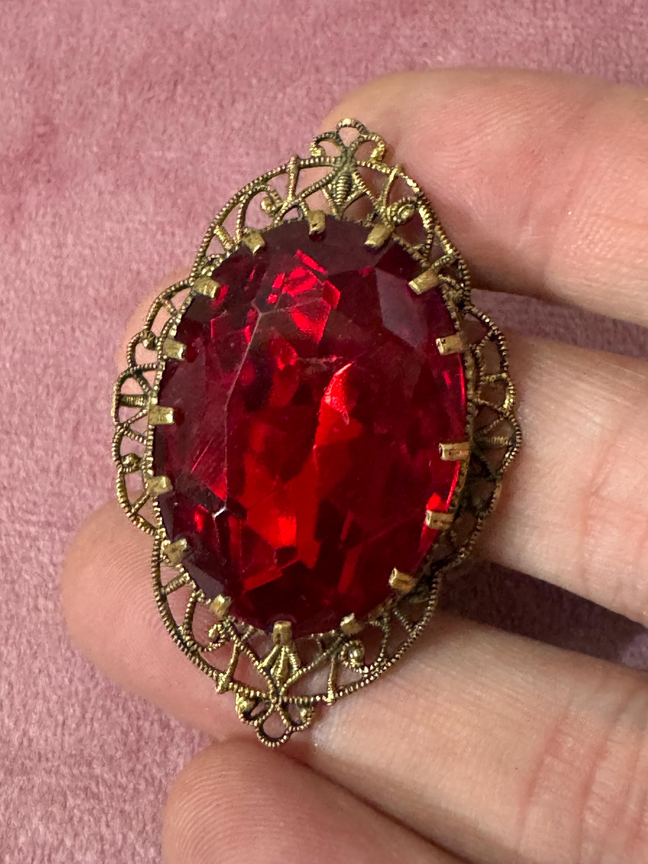 Antique Art Deco Czech brass gilt metal filigree brooch with red faux ruby glass paste rhinestones ornate