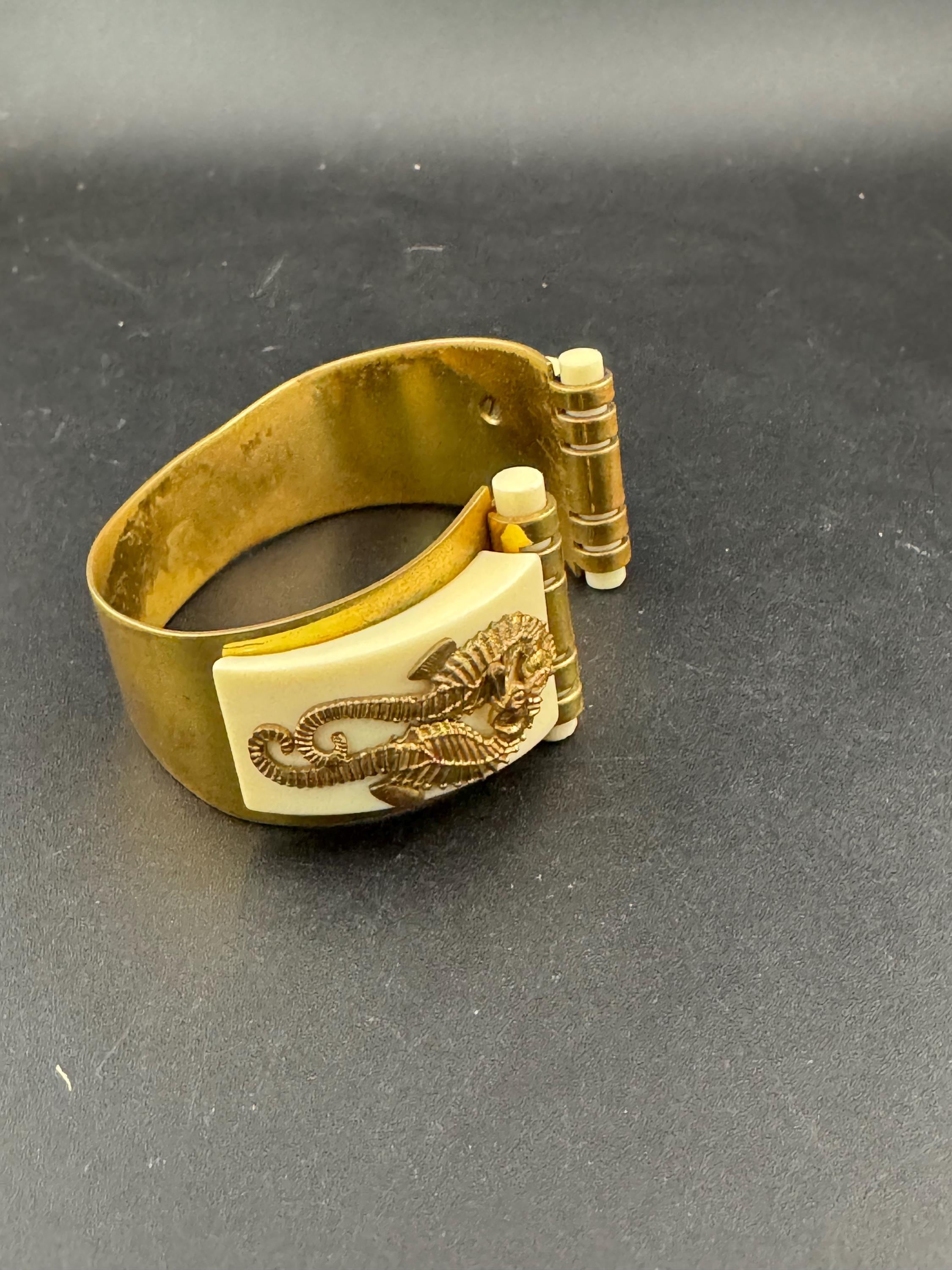 Super Vintage art deco brass and galalith seahorse Bangle bracelet , attributed to Jean Painleve l’hippocampus range