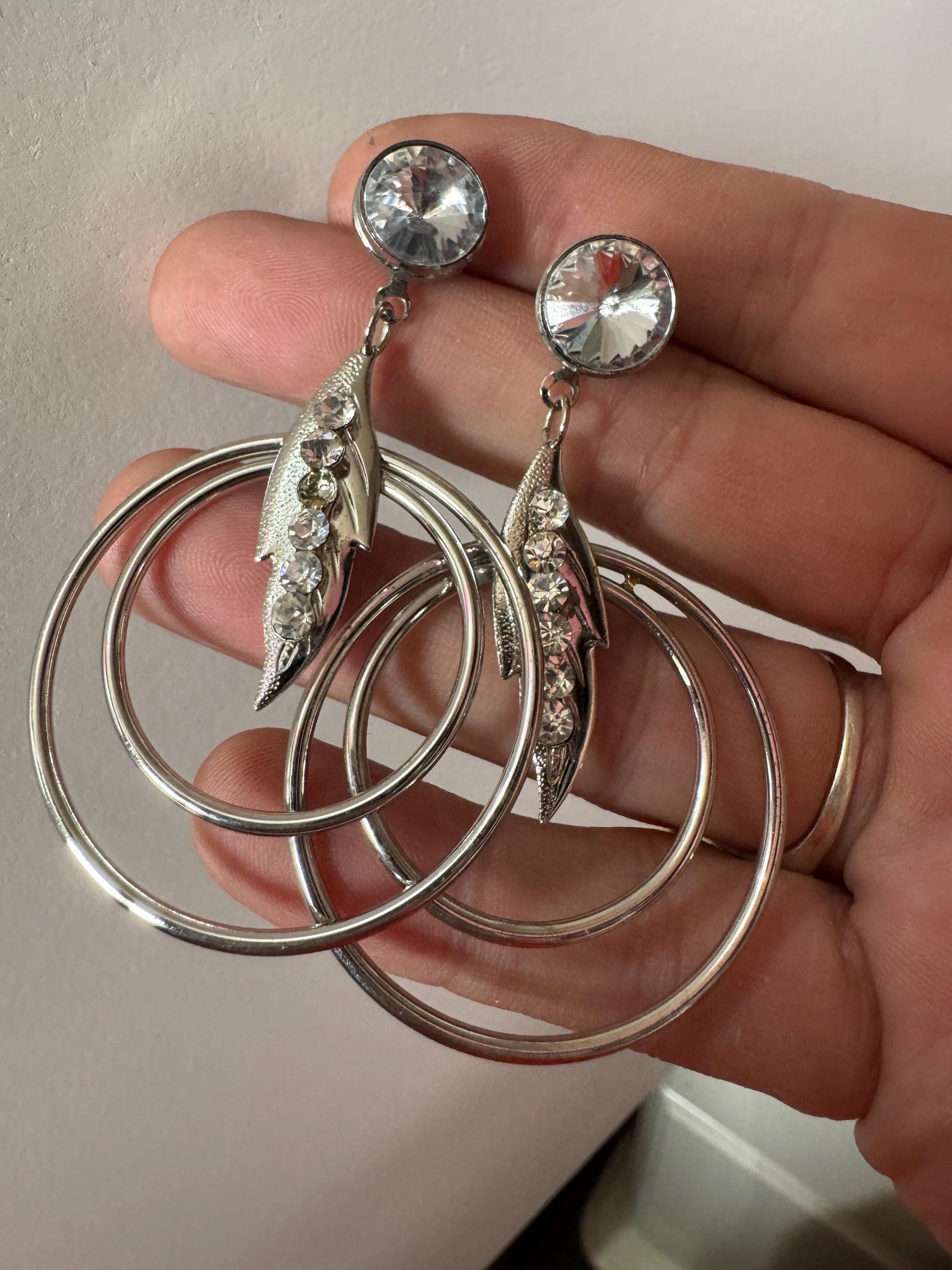 Vintage modernist silver tone 1980s big hoop drop earrings set with clear crystal and metal rings for pierced ears