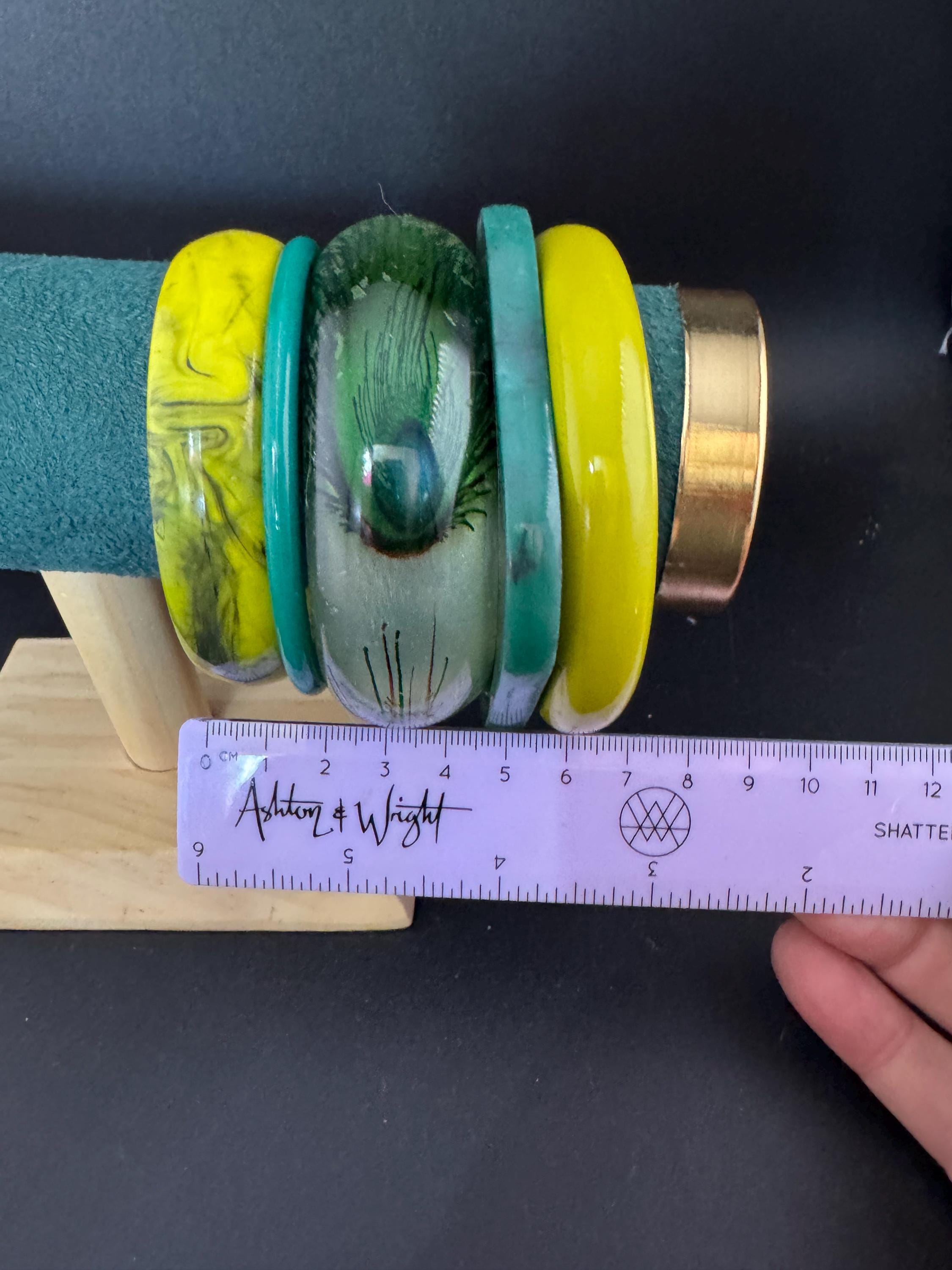 Vintage and retro curated stack of GREEN plastic acrylic bangles, bracelets