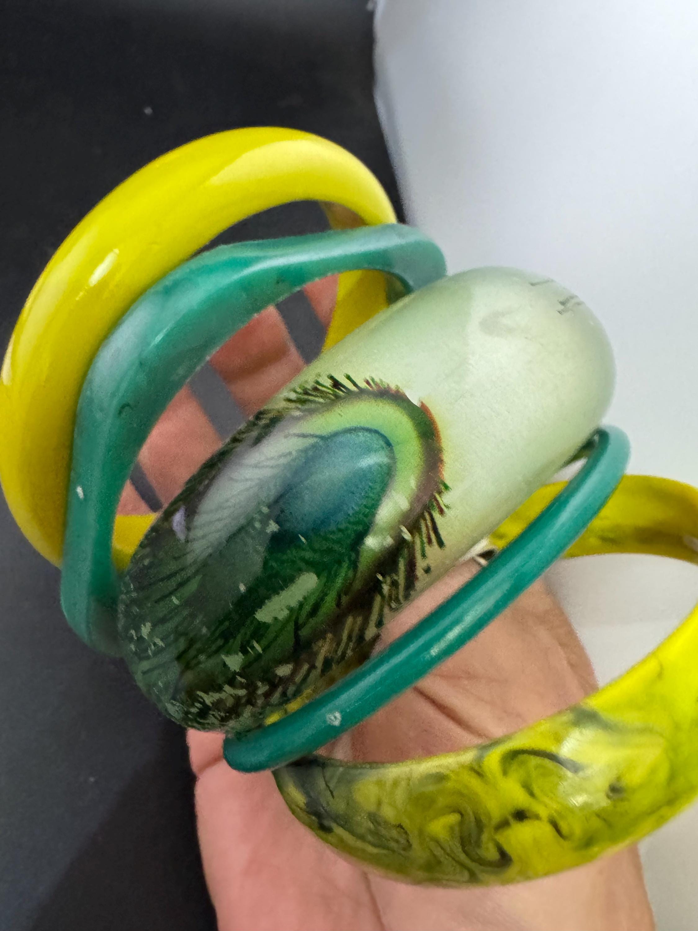 Vintage and retro curated stack of GREEN plastic acrylic bangles, bracelets