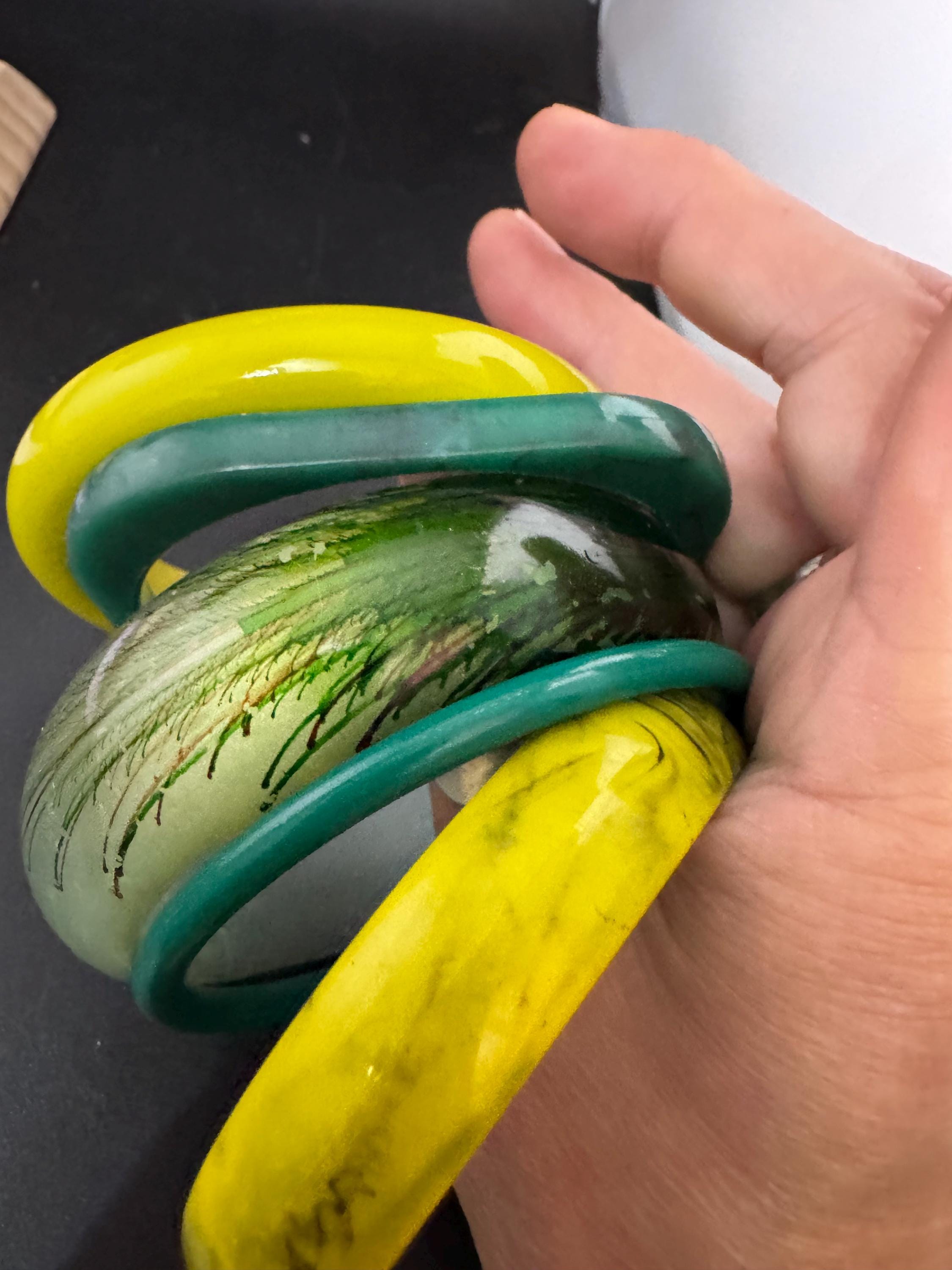 Vintage and retro curated stack of GREEN plastic acrylic bangles, bracelets