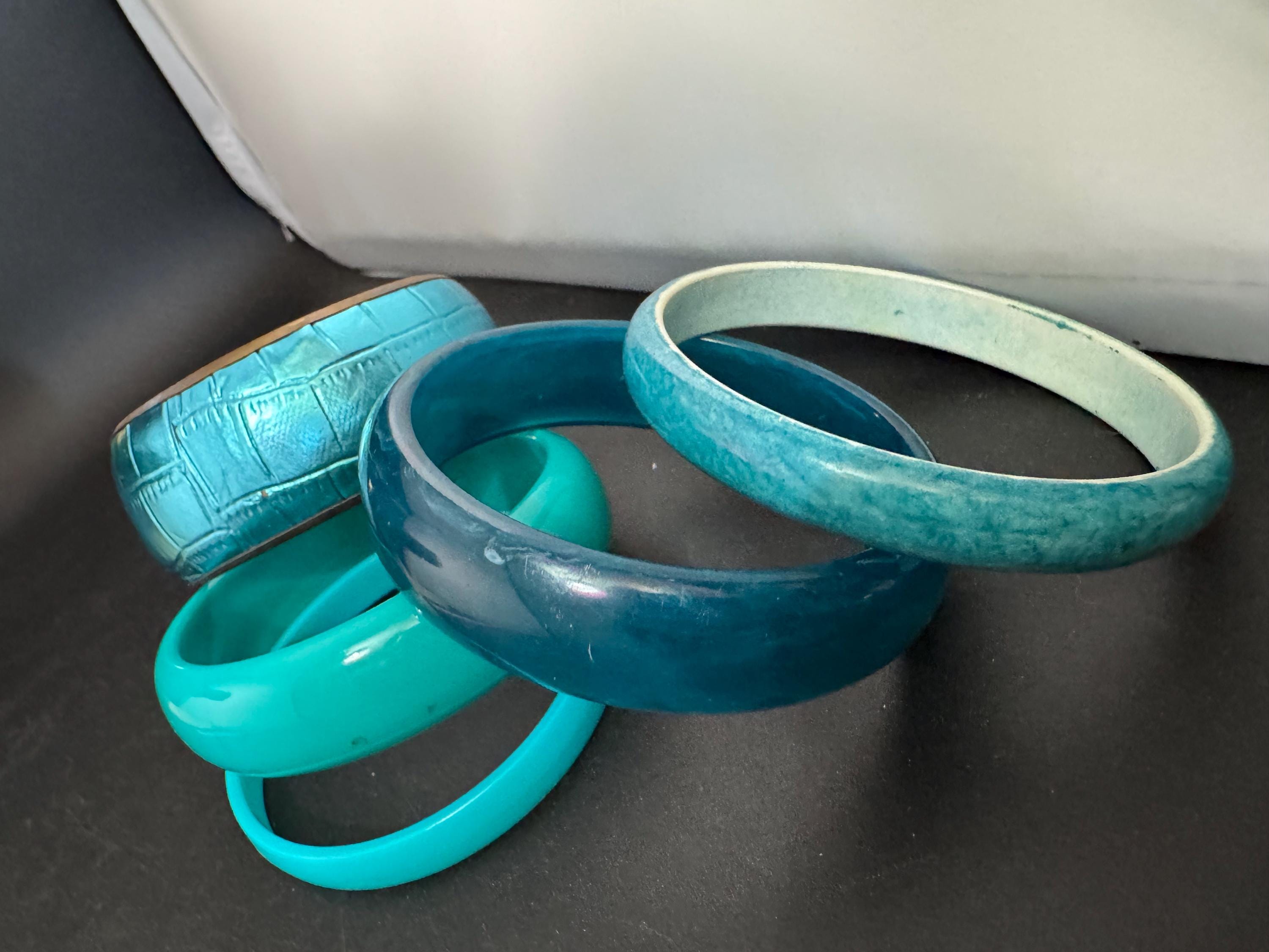 A curated set of BLUE vintage retro stack of plastic metal bangles bracelets
