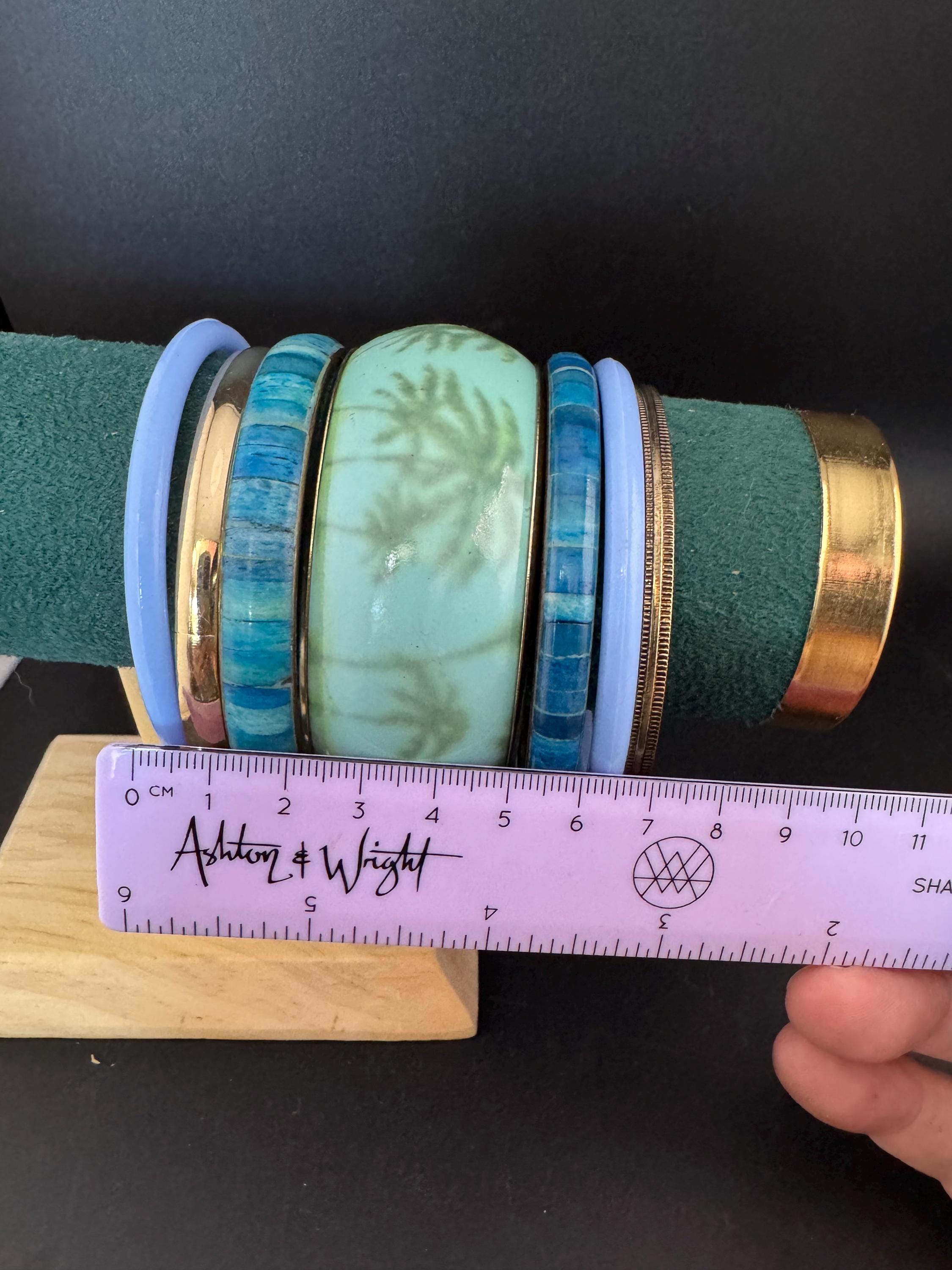 A curated set of BLUE vintage retro stack of plastic metal bangles bracelets