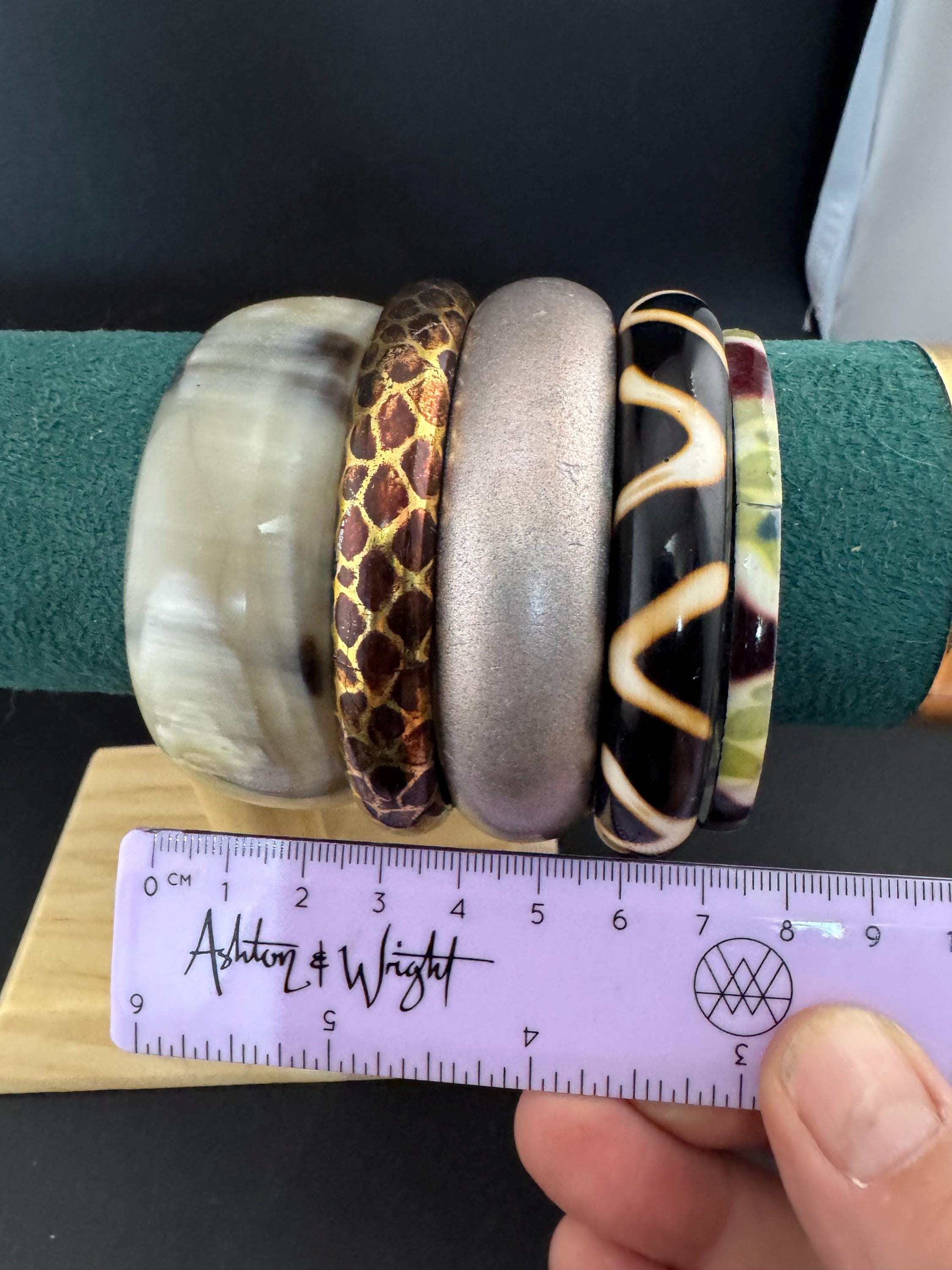 Cream brown yellow animal print beige stack of vintage retro plastic metal bangles
