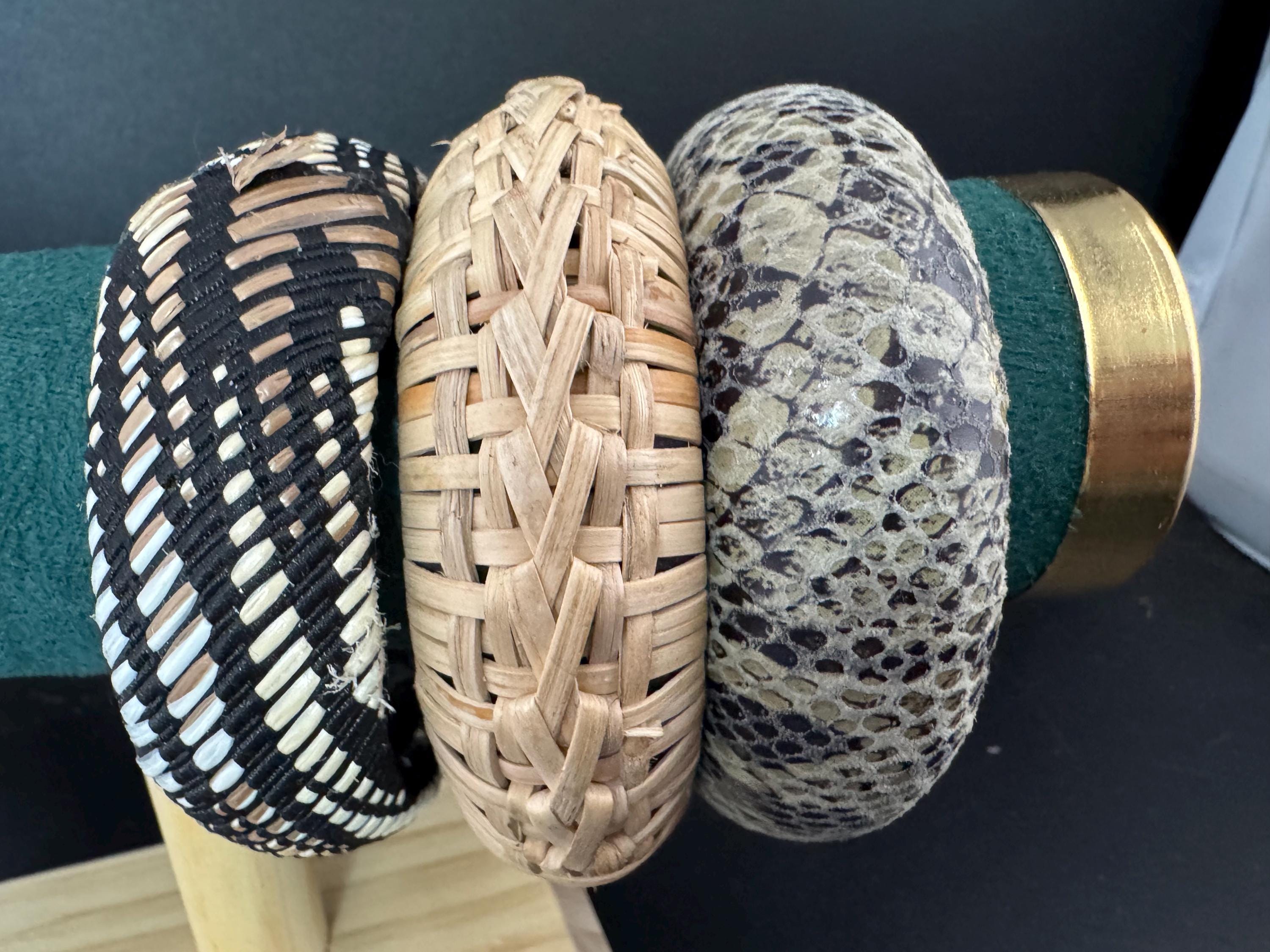 Curated stack of vintage wooden plastic and metal stacking bangles in brown natural shades ethnic tribal boho festival bracelets