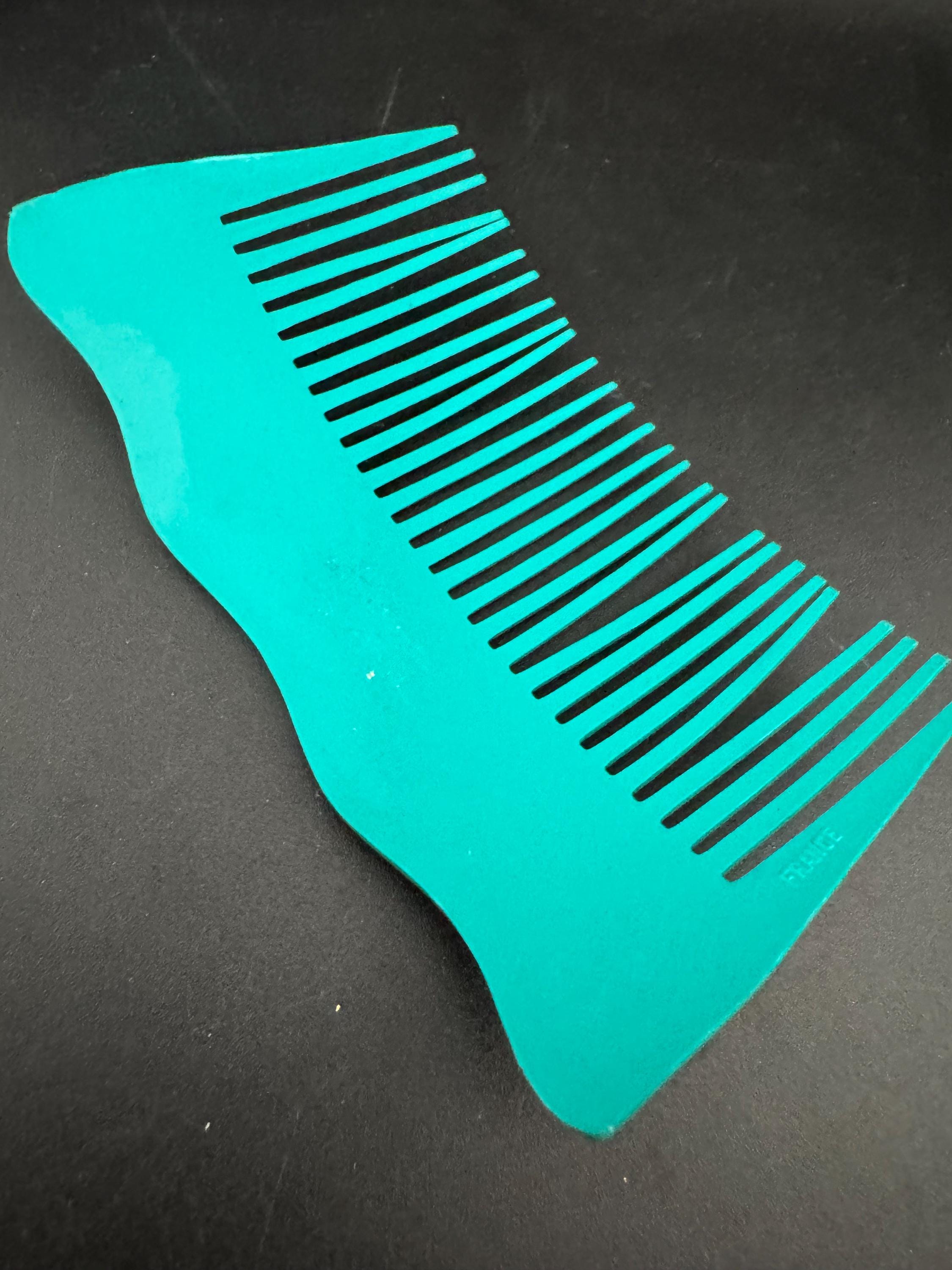 Vintage wide bright teal green plastic hair comb
