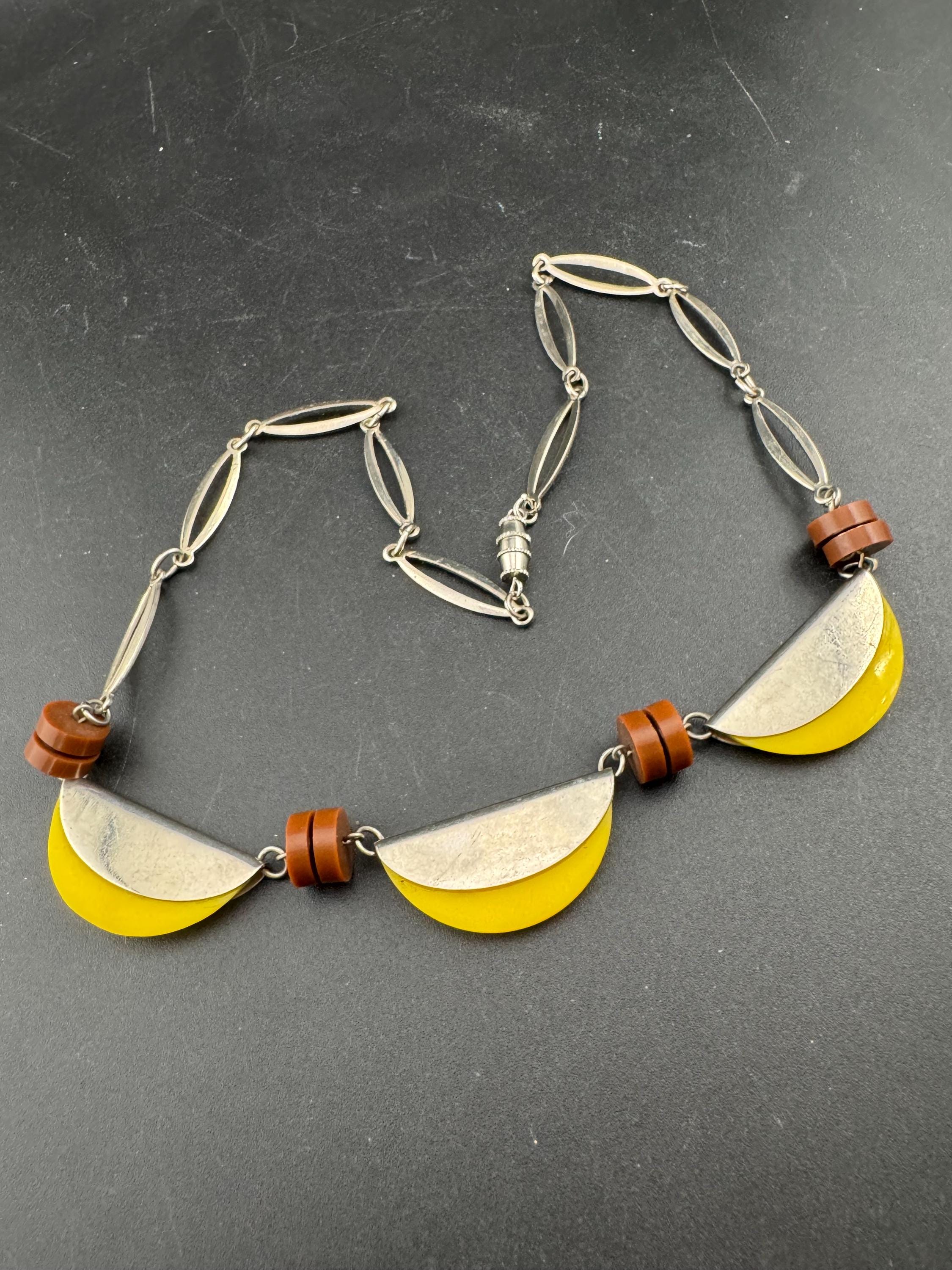 Art deco Jakob Bengel modernist Chrome silver tone metal 1920s brown and yellow galalith plastic semicircle beaded geometric bead necklace