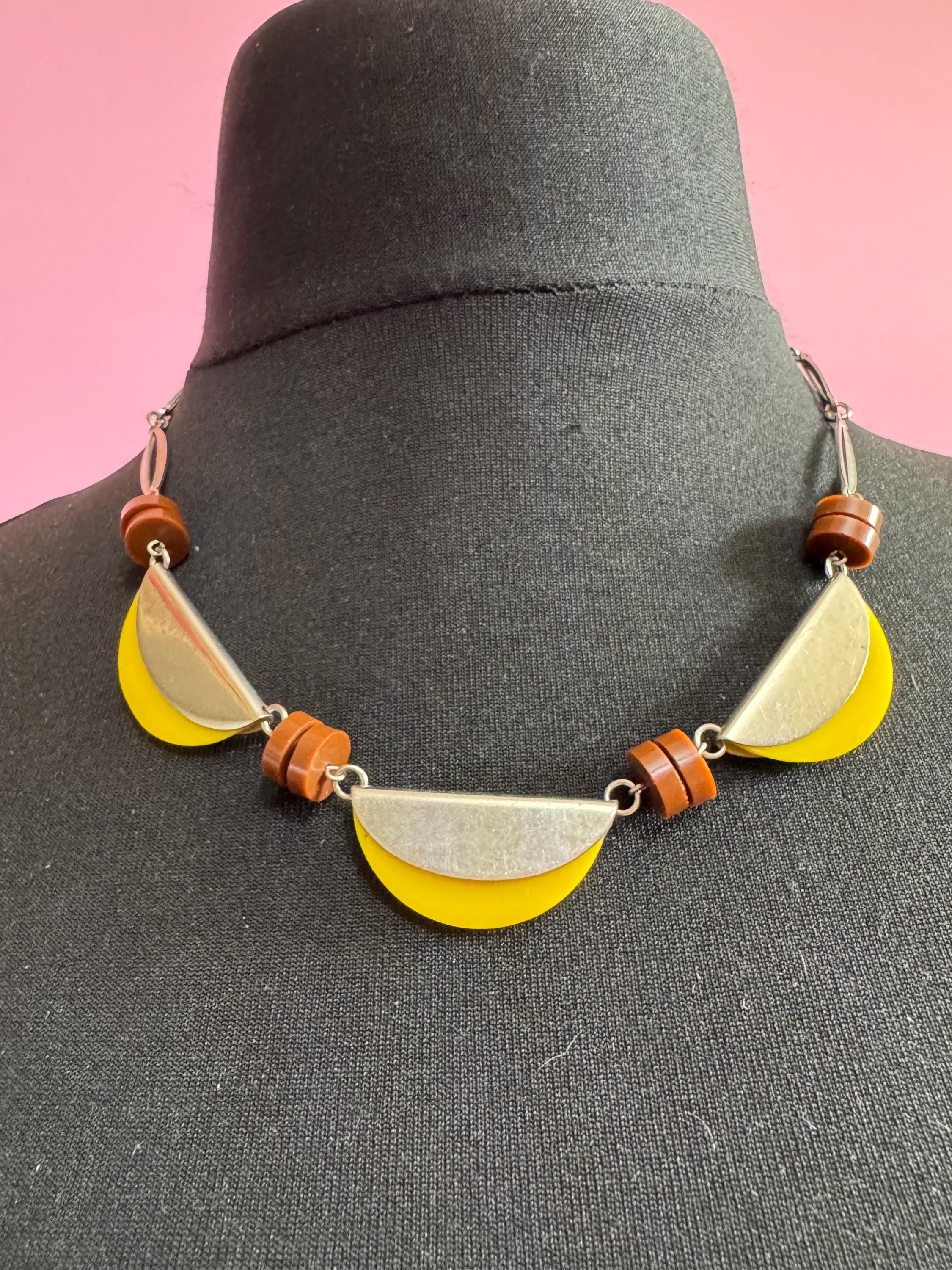 Art deco Jakob Bengel modernist Chrome silver tone metal 1920s brown and yellow galalith plastic semicircle beaded geometric bead necklace