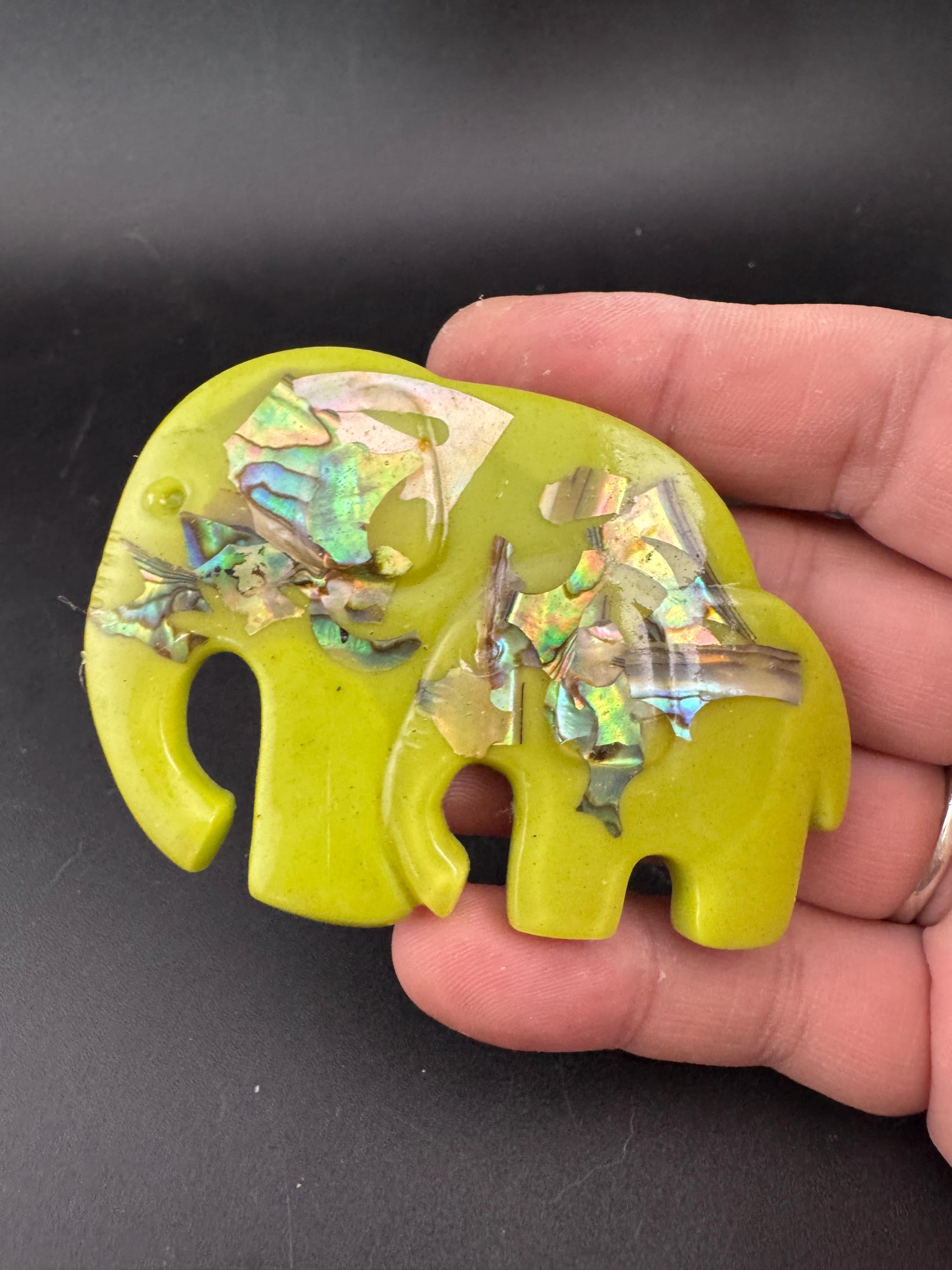 big lime green elephant and baby brooch inset with abalone shell, early plastic 1960s