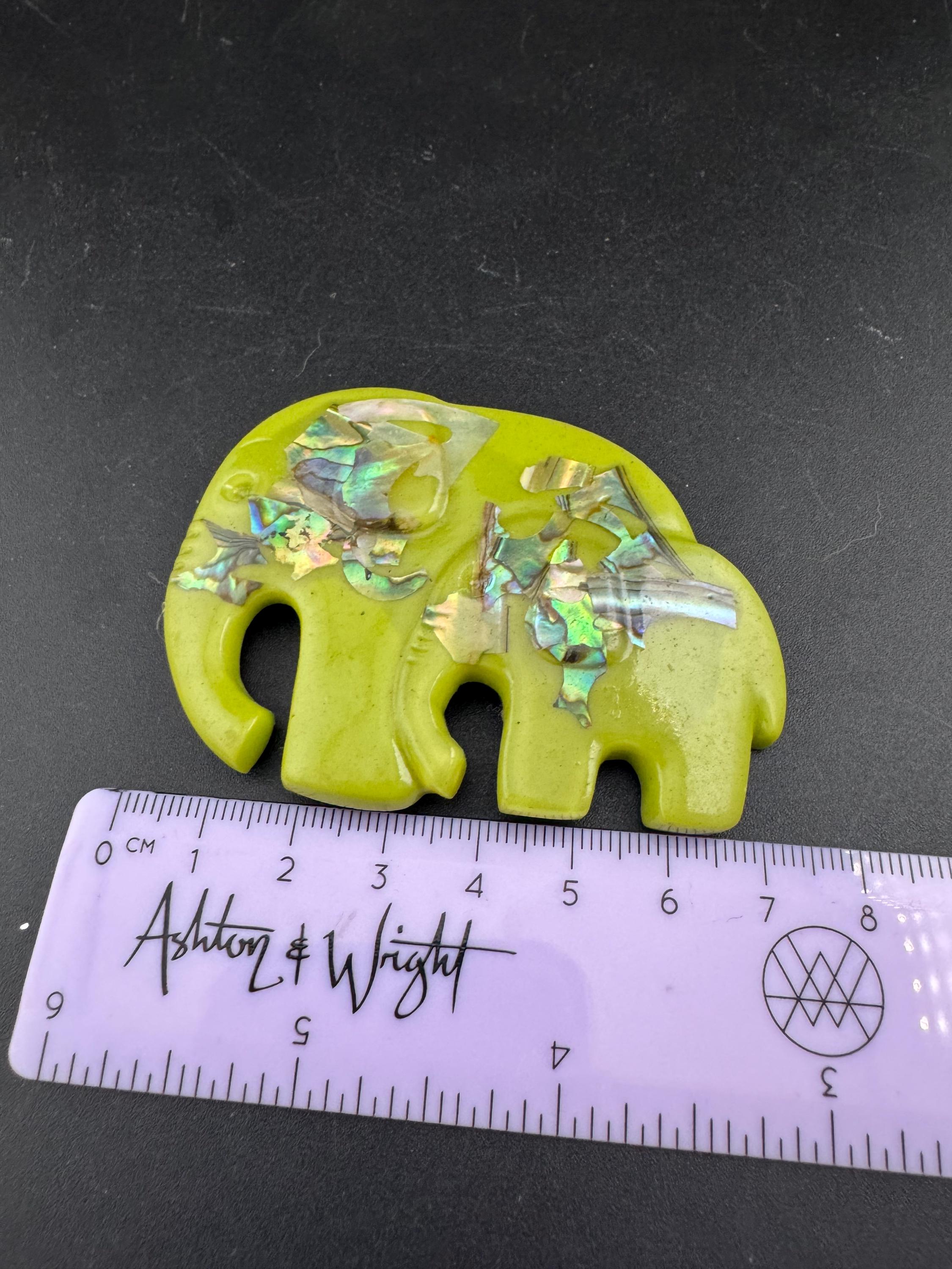 big lime green elephant and baby brooch inset with abalone shell, early plastic 1960s
