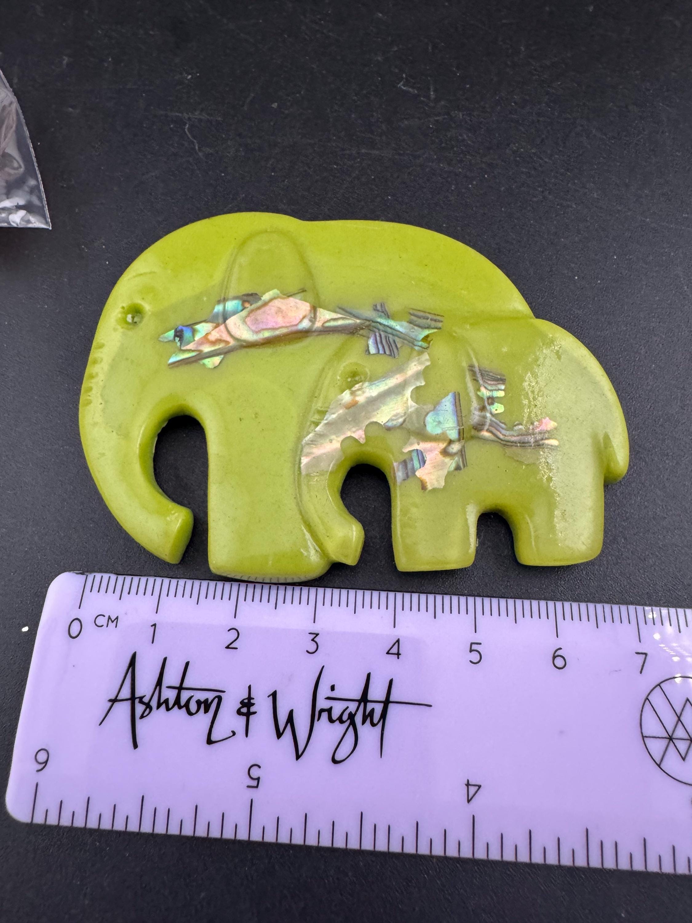 big lime green elephant and baby brooch inset with abalone shell, early plastic 1960s