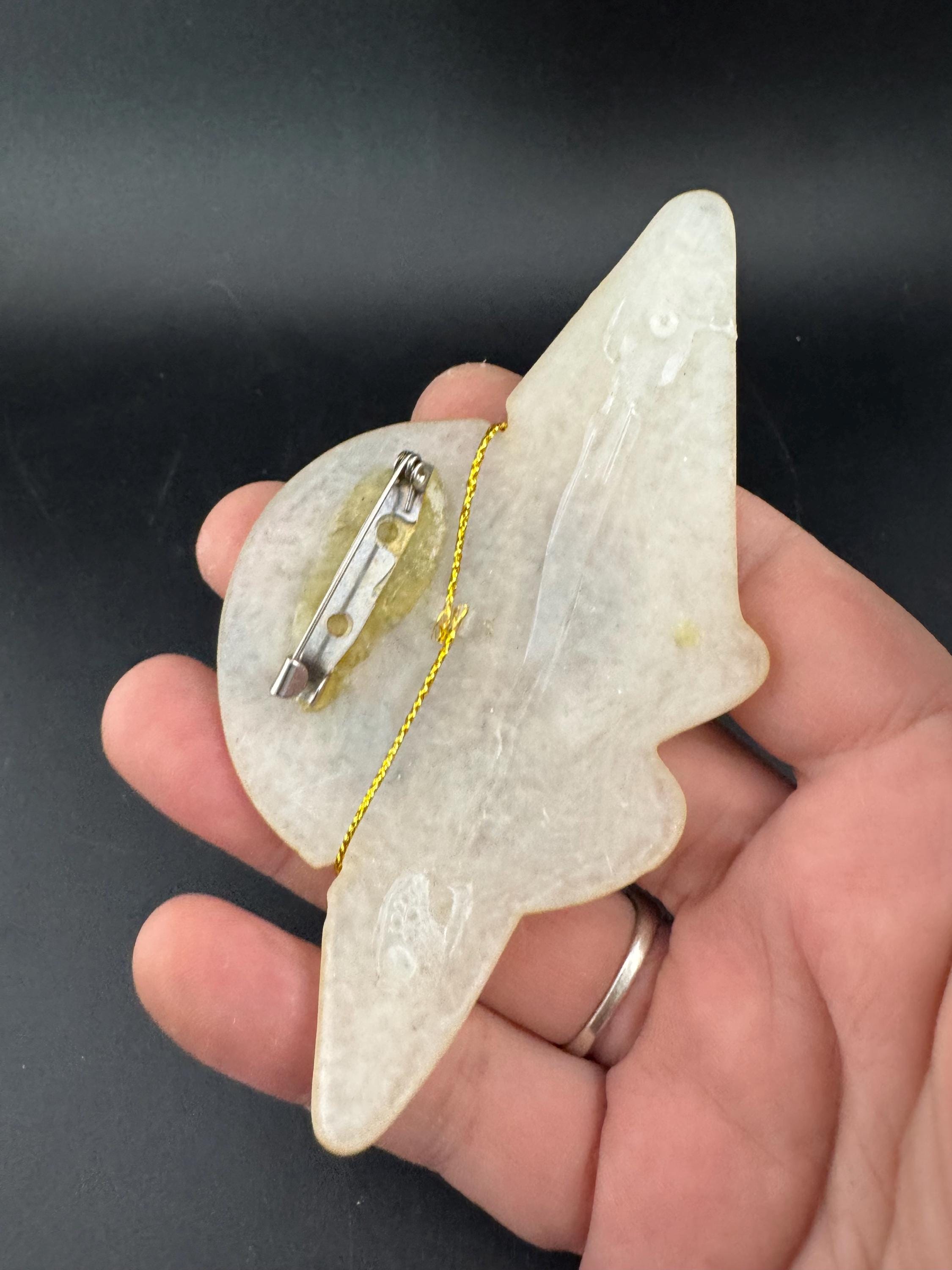 Oversized vintage lady in wide brimmed hat pearly lucite cream brooch inset with abalone shell, early plastic 1960s