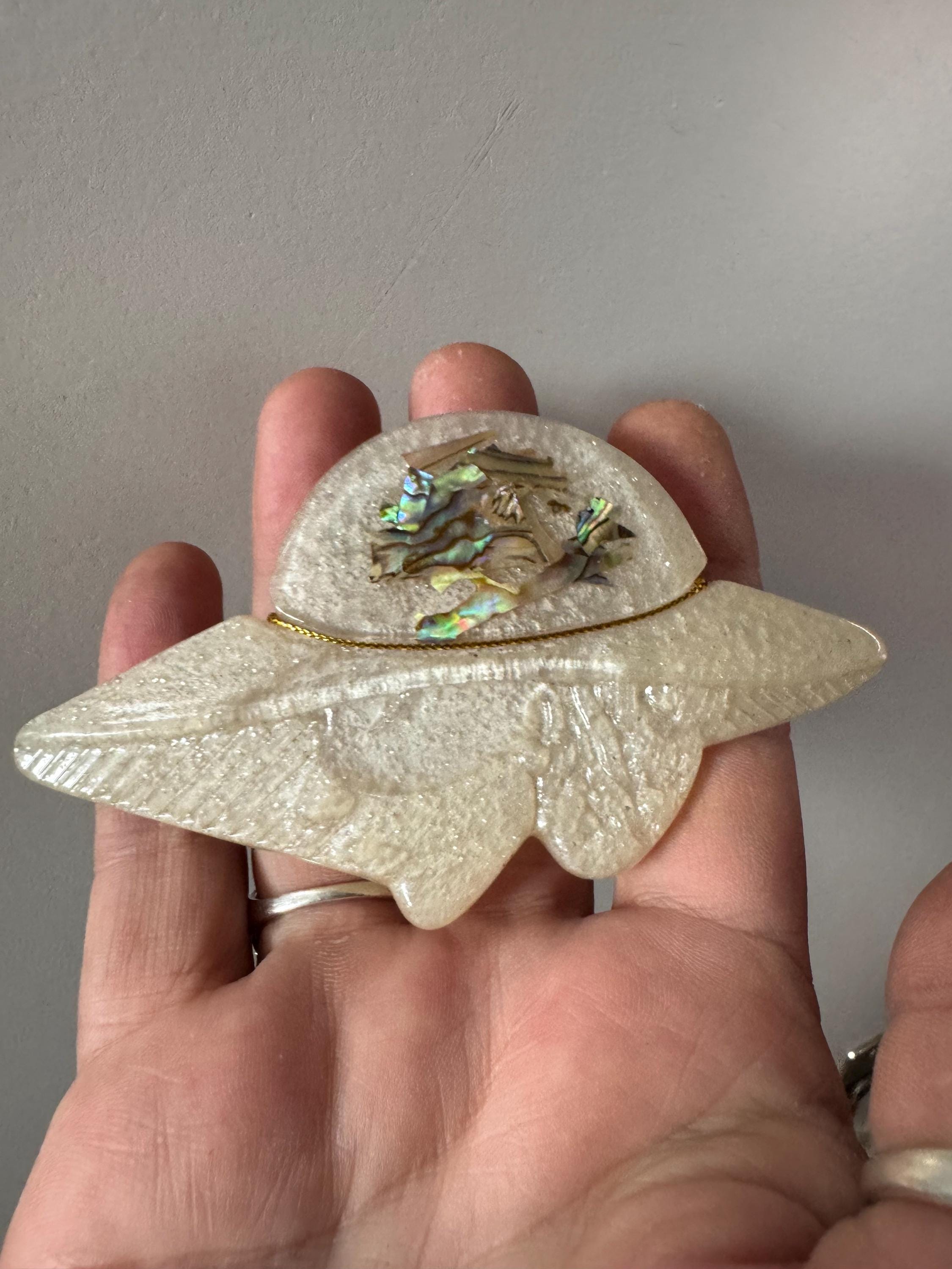 Oversized vintage lady in wide brimmed hat pearly lucite cream brooch inset with abalone shell, early plastic 1960s