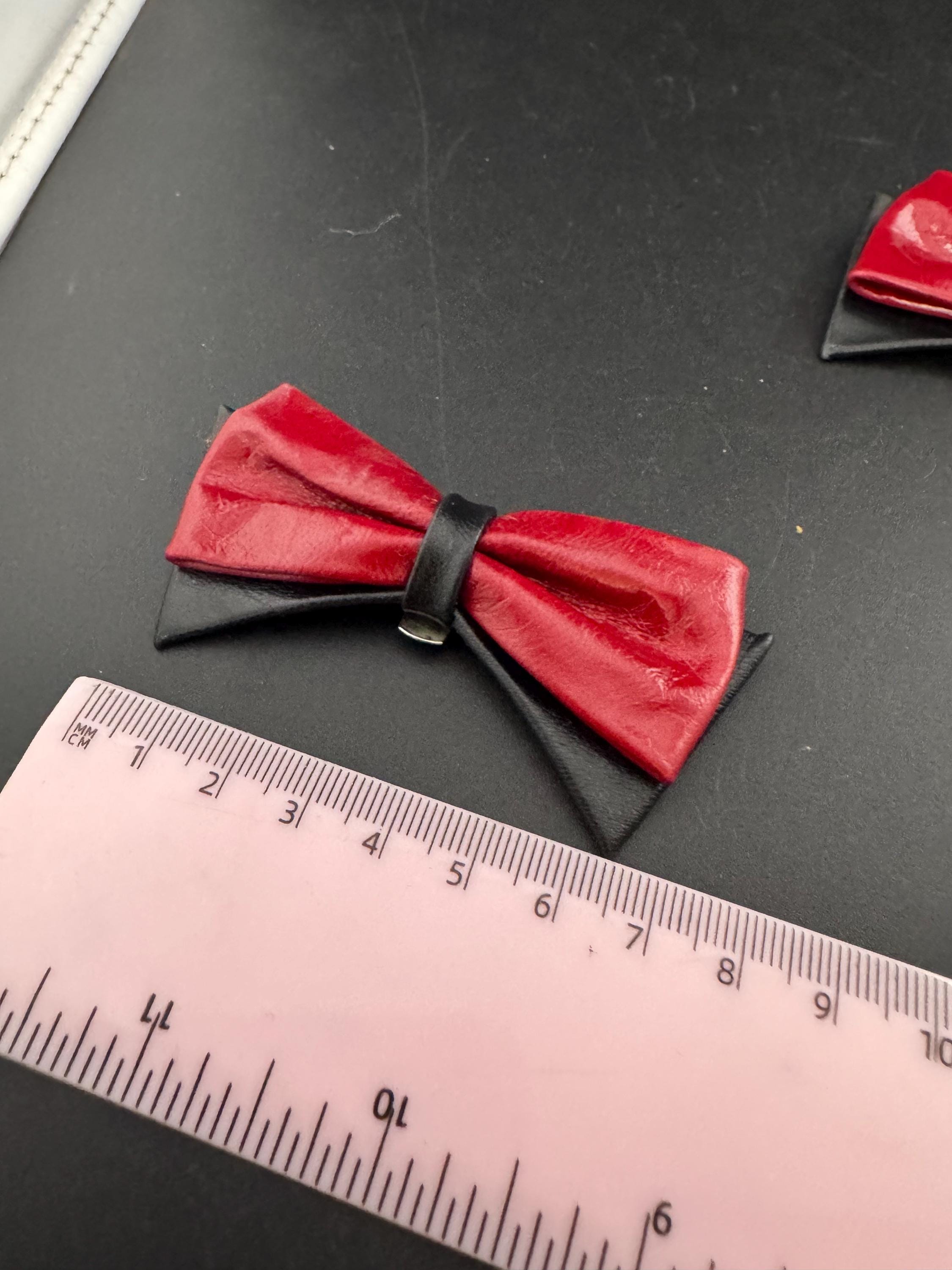 Vintage pair of black and dark red leather twist detail shoe clips trims ideal pumps flats decorations 1980s 1990s