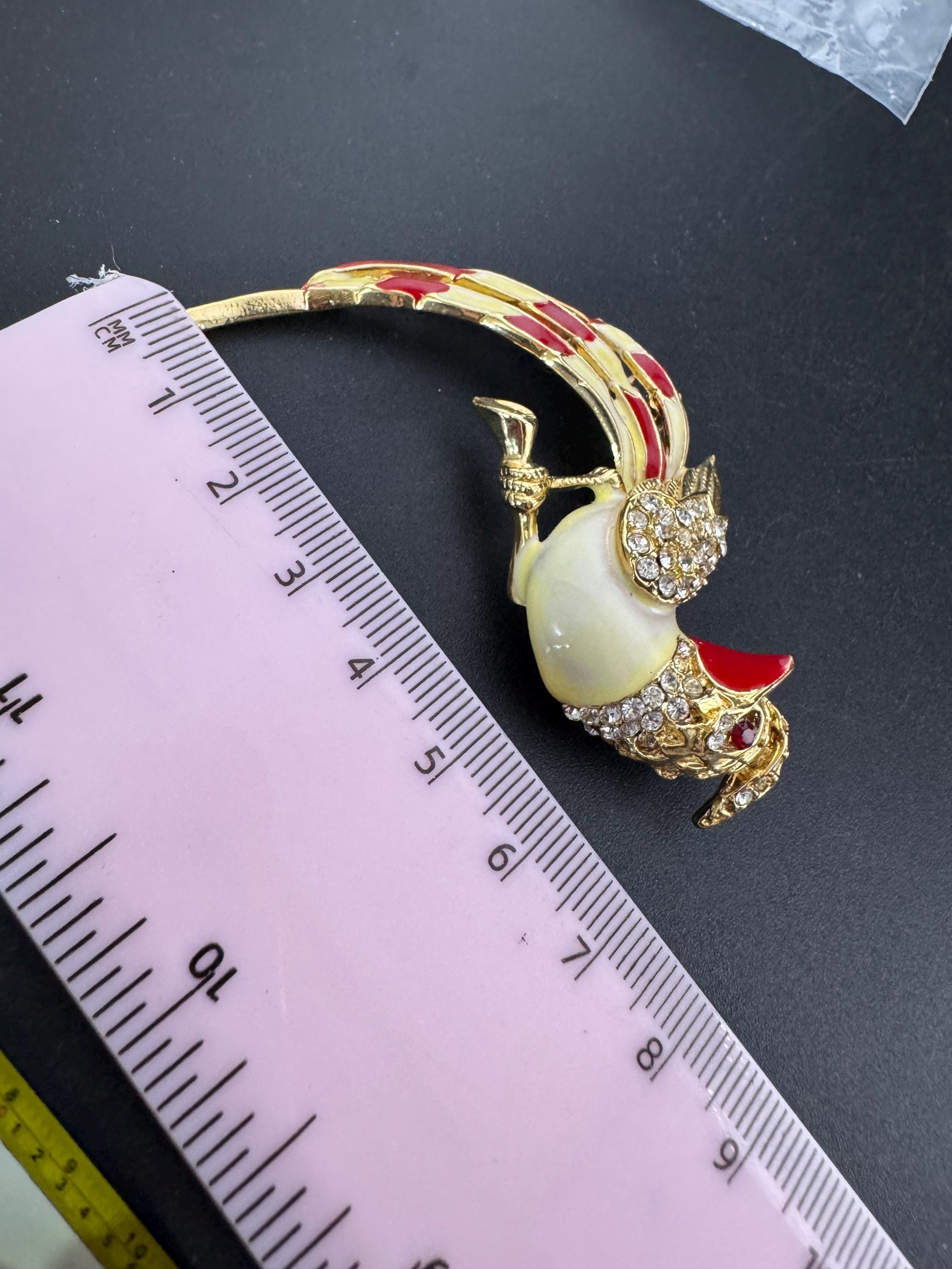 Vintage Tropical Parrot firecrest brooch set with Paste diamanté and red and cream Enamel gold tone metal 1980s