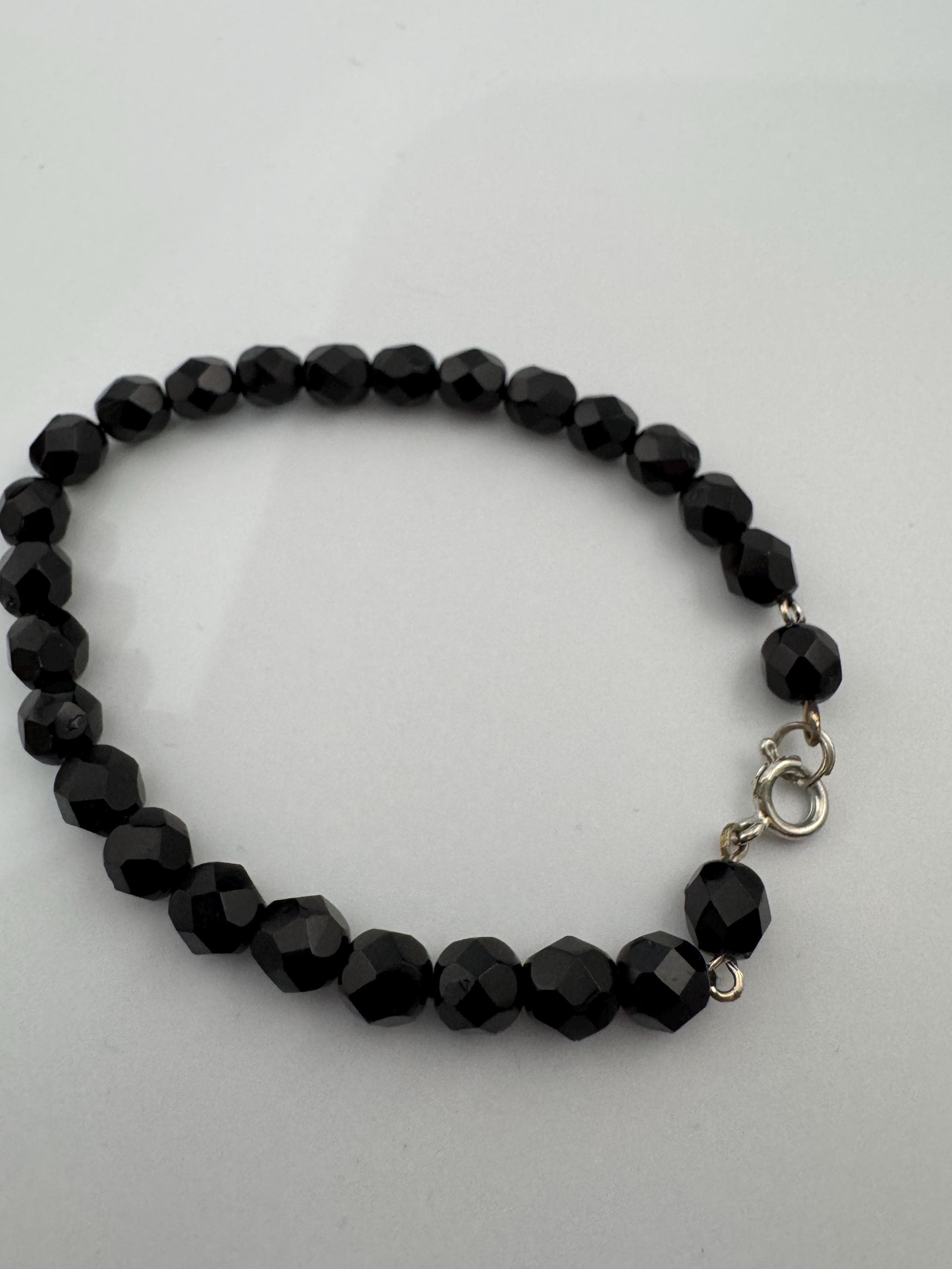 French jet glass black bead bracelet , 21cm price each