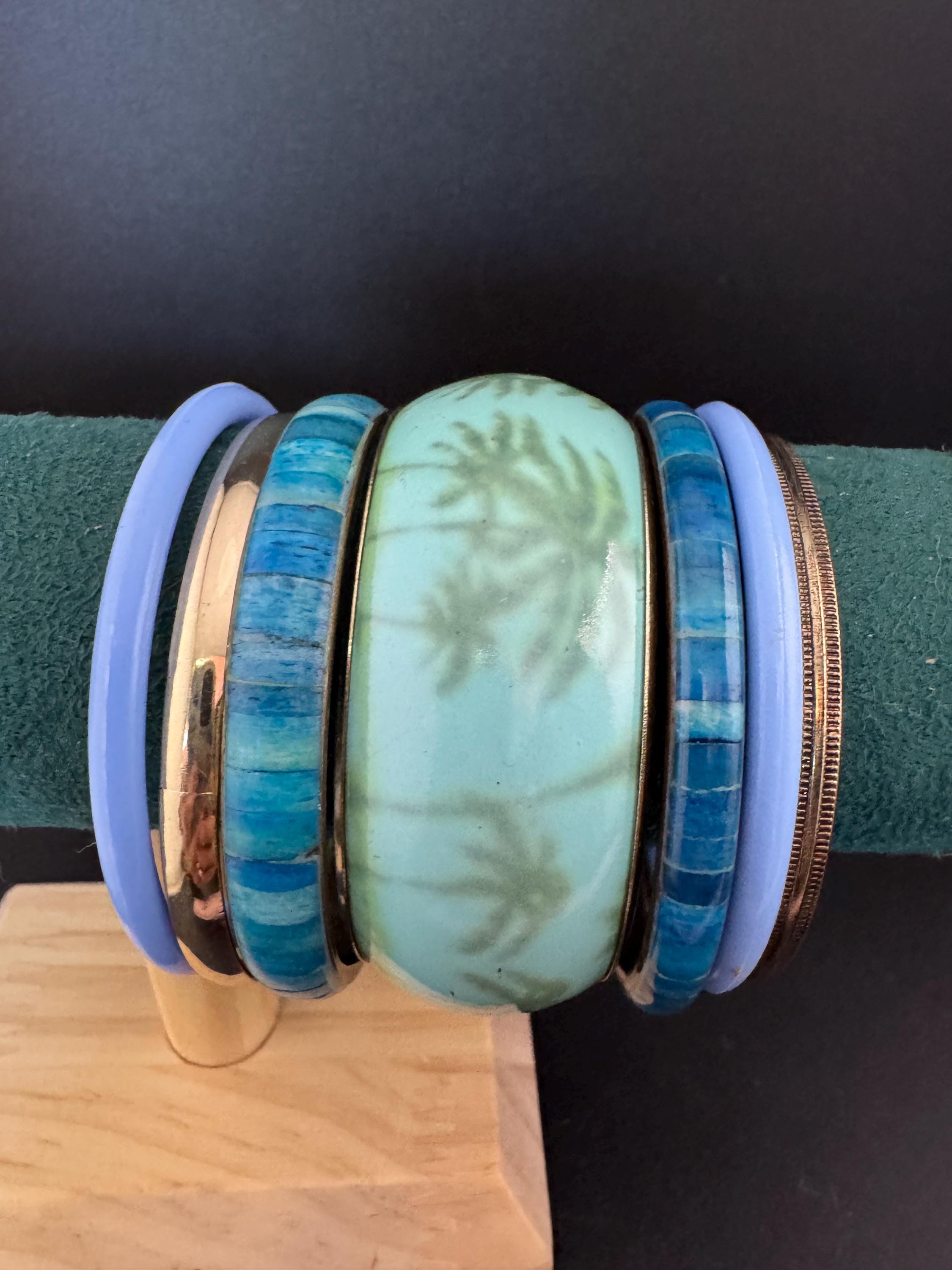 A curated set of BLUE vintage retro stack of plastic metal bangles bracelets