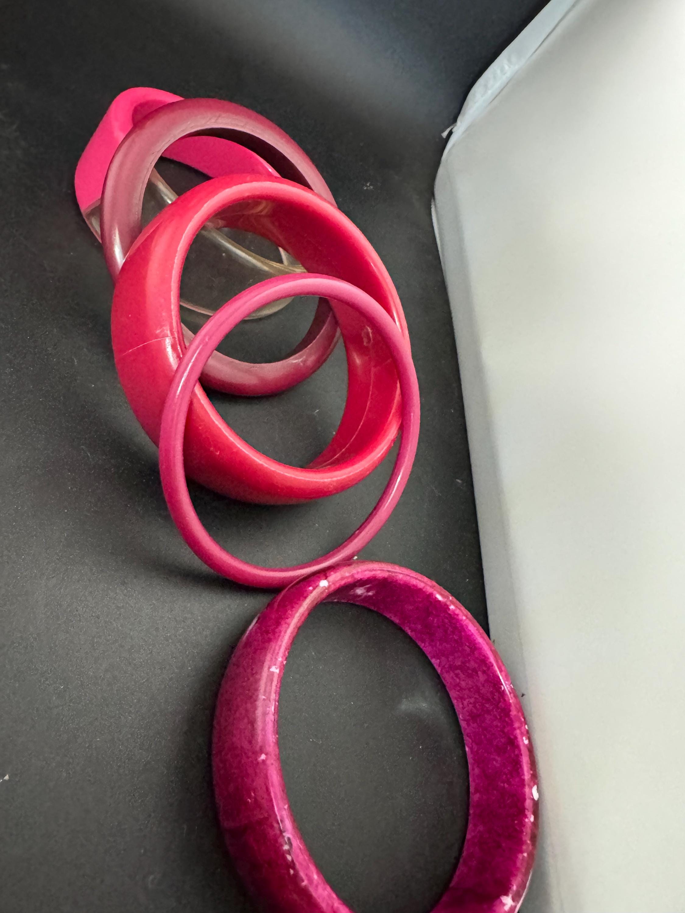 Vintage stack of pink purple plastic bangles retro acrylic bracelets