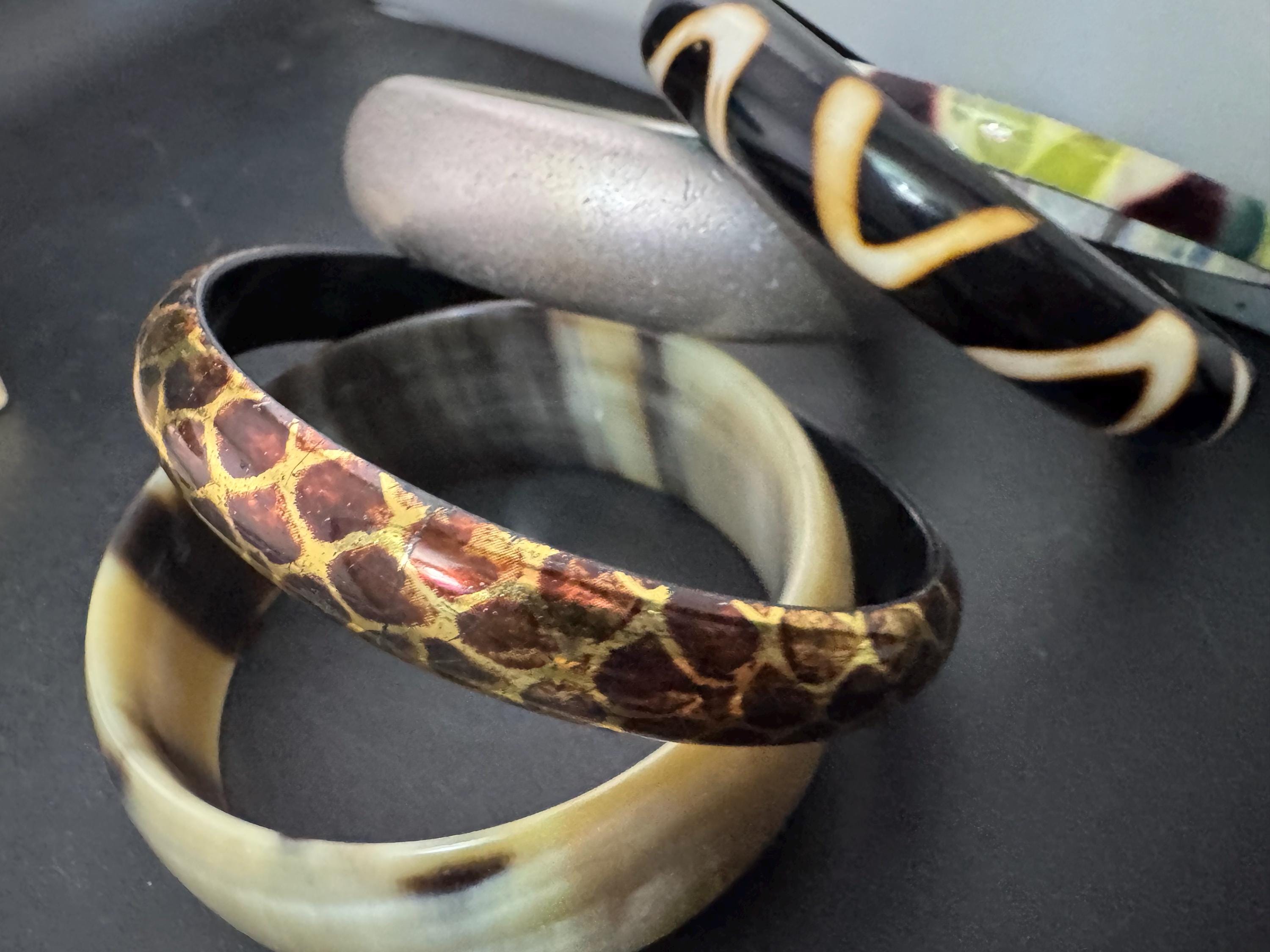 Cream brown yellow animal print beige stack of vintage retro plastic metal bangles