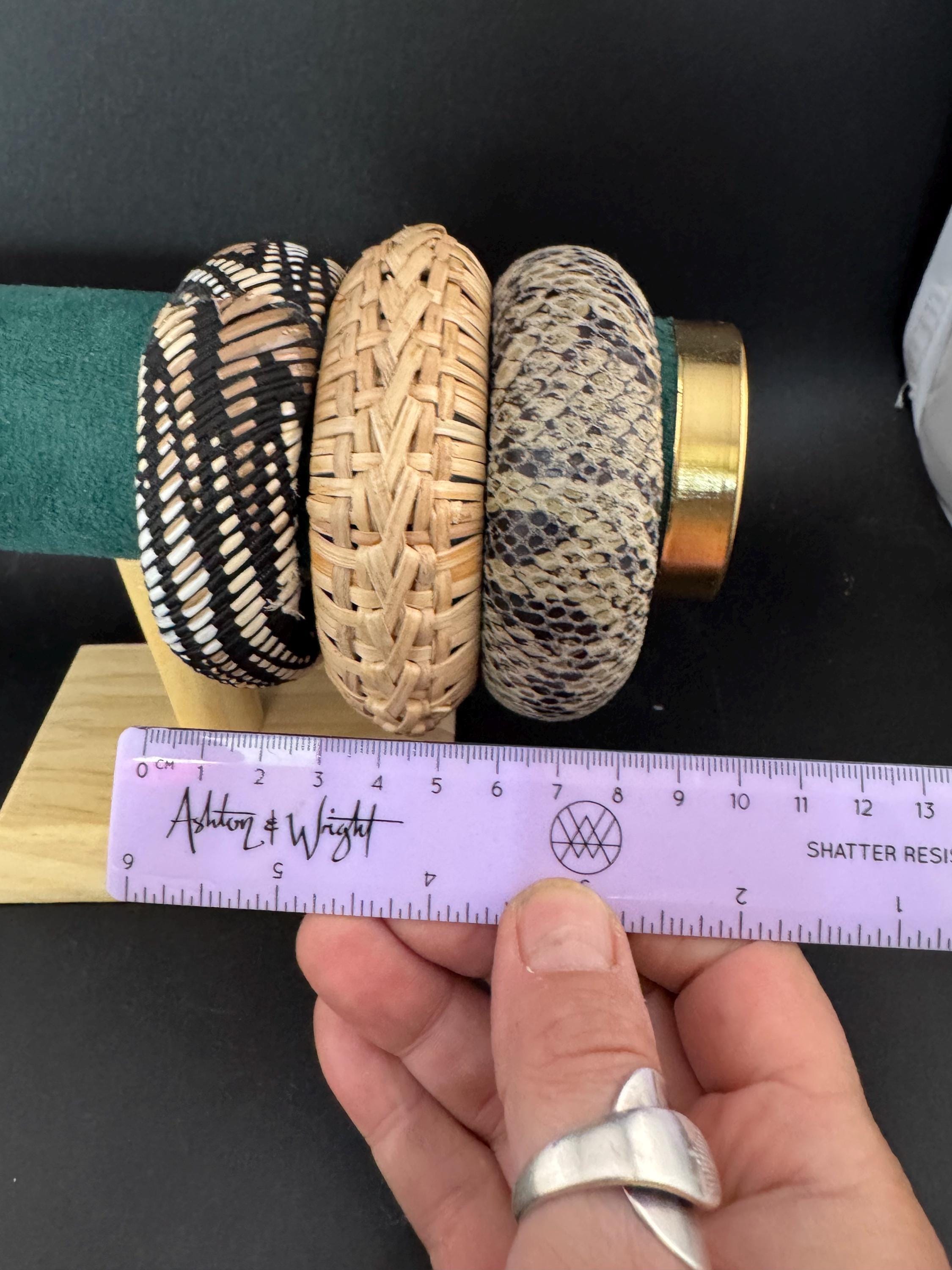 Curated stack of vintage wooden plastic and metal stacking bangles in brown natural shades ethnic tribal boho festival bracelets