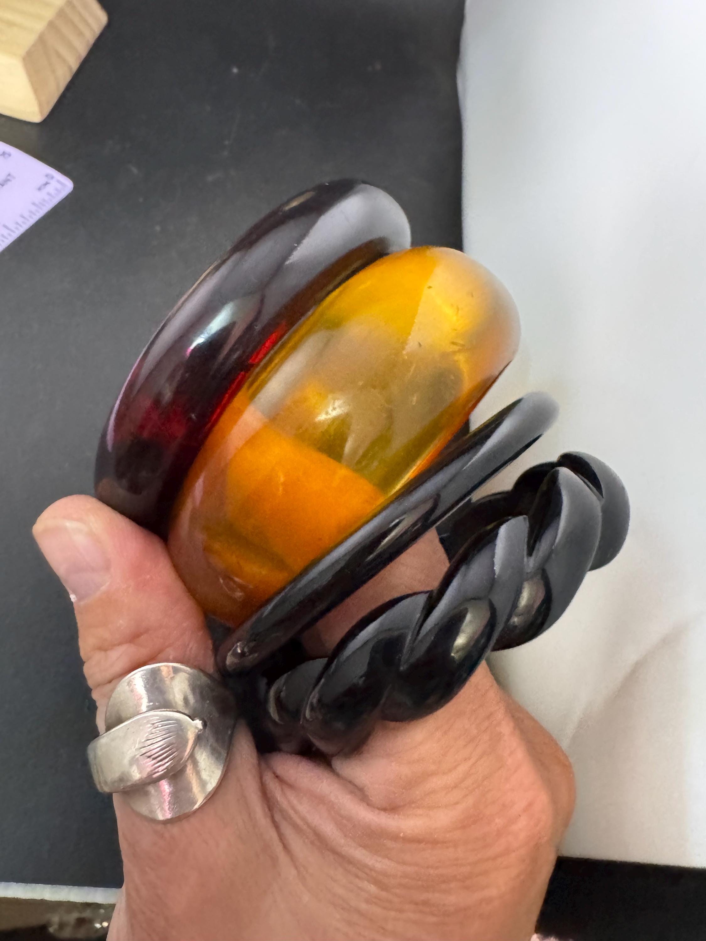 A curated stack of Faux tortoiseshell brown back Perspex plastic wide cuff bangle bracelets ideal stacking layering Vintage