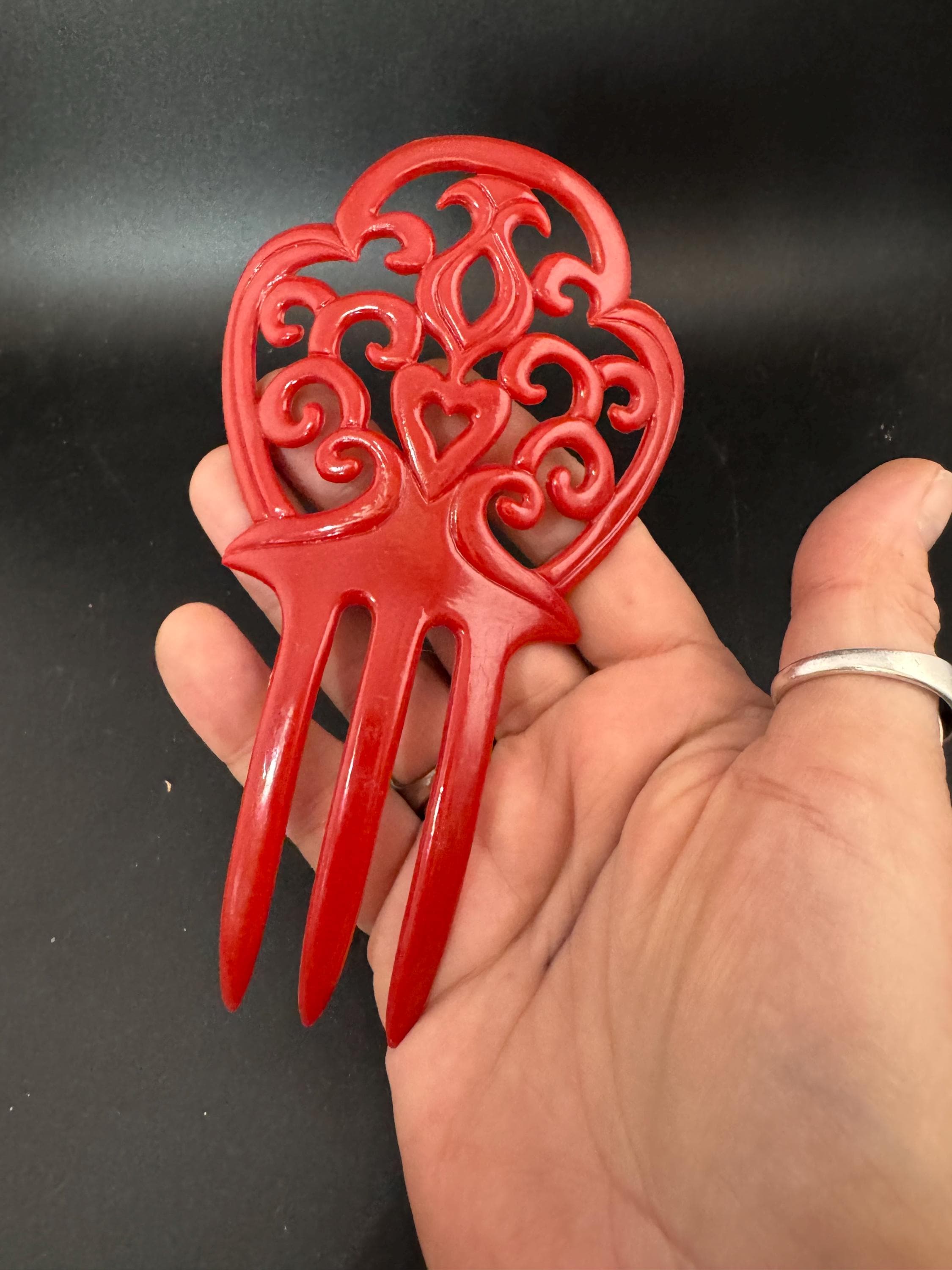 vintage dark red openwork plastic traditional Spanish peineta hair comb, mantilla