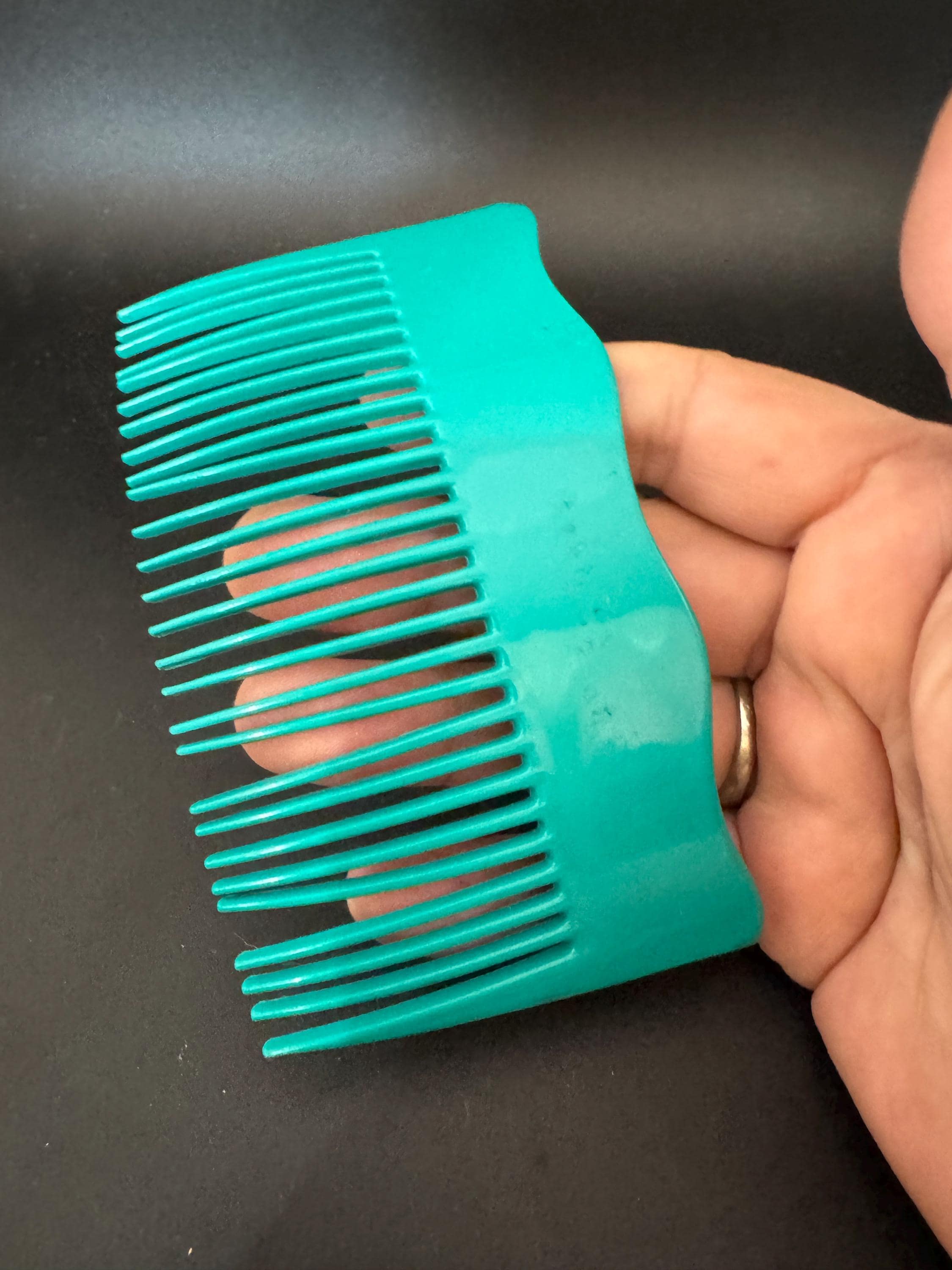 Vintage wide bright teal green plastic hair comb