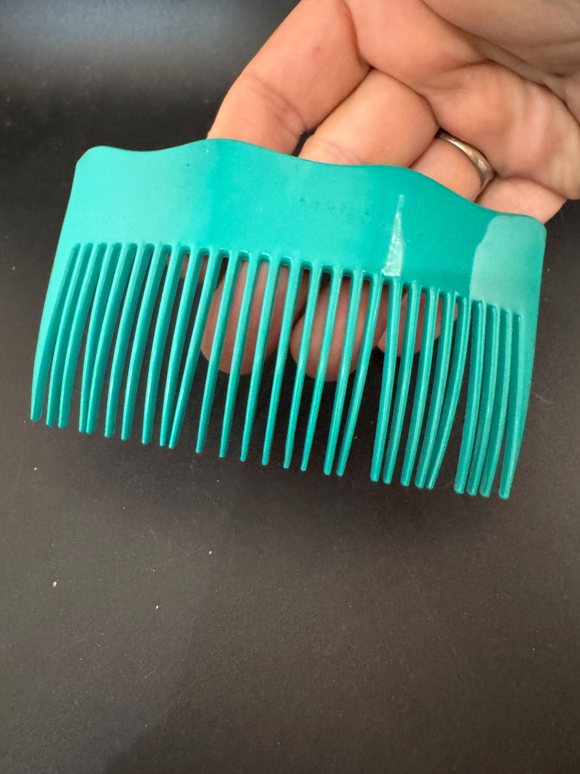 Vintage wide bright teal green plastic hair comb