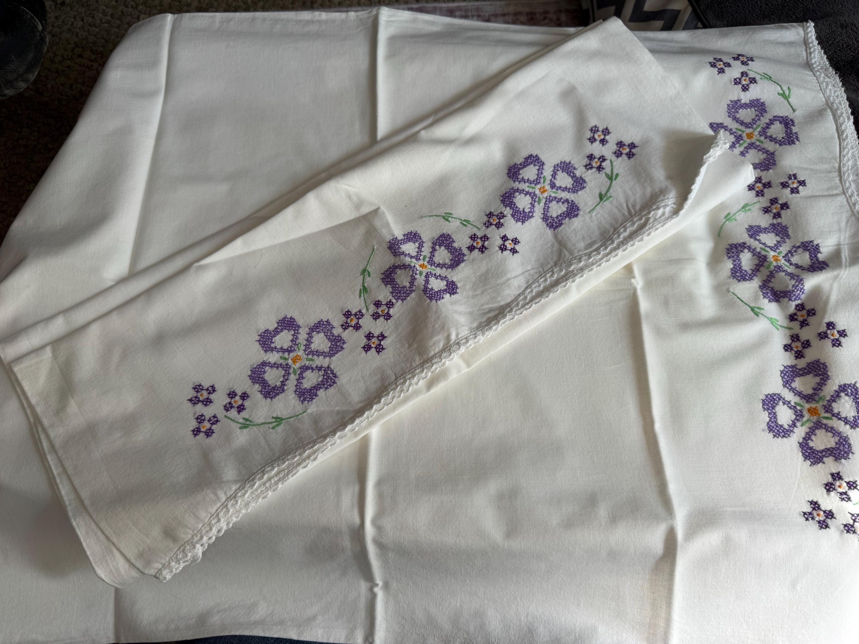 Vintage HAND embroidered floral pair of pillowcases purple flowers green pastels