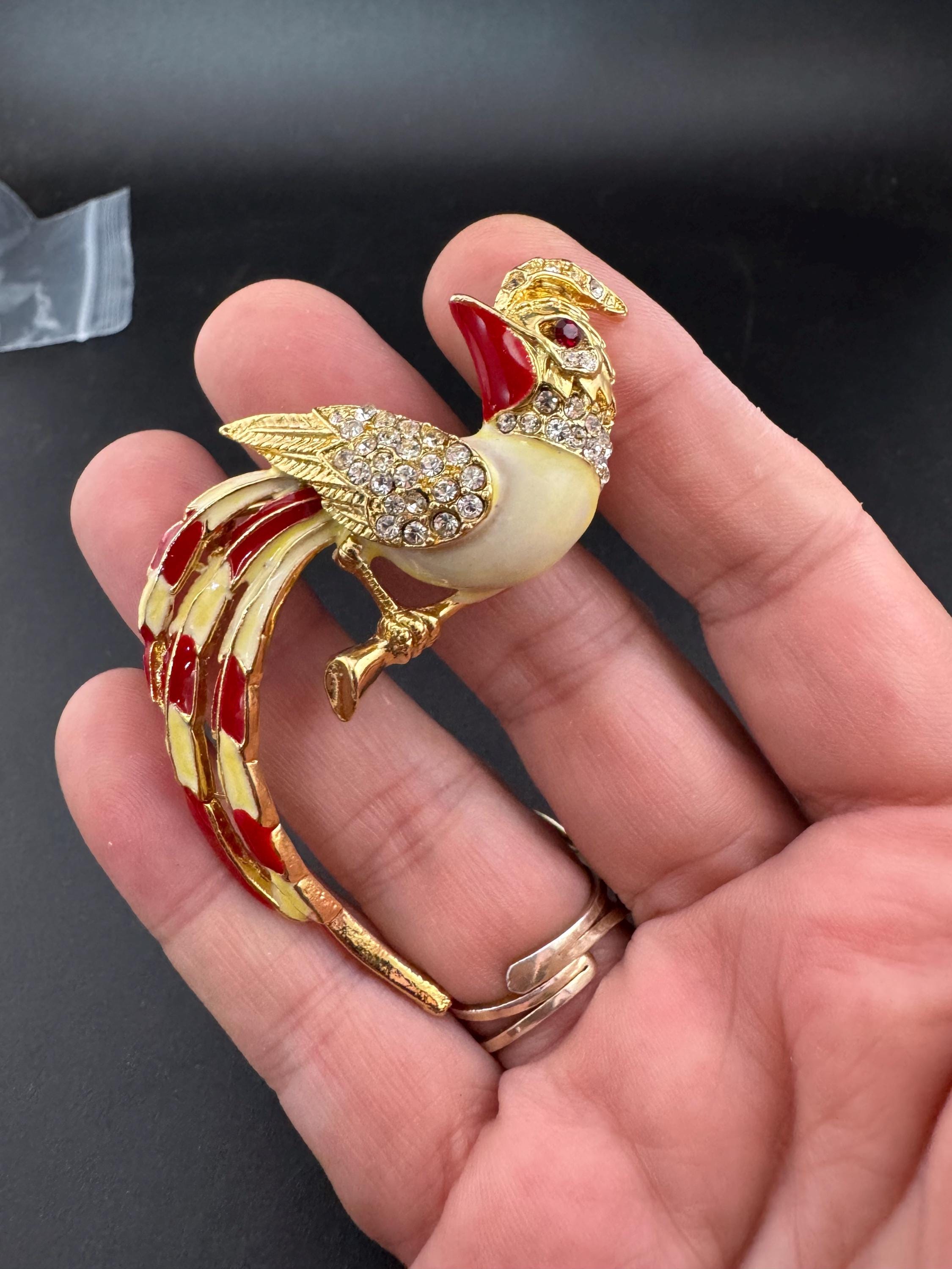 Vintage Tropical Parrot firecrest brooch set with Paste diamanté and red and cream Enamel gold tone metal 1980s