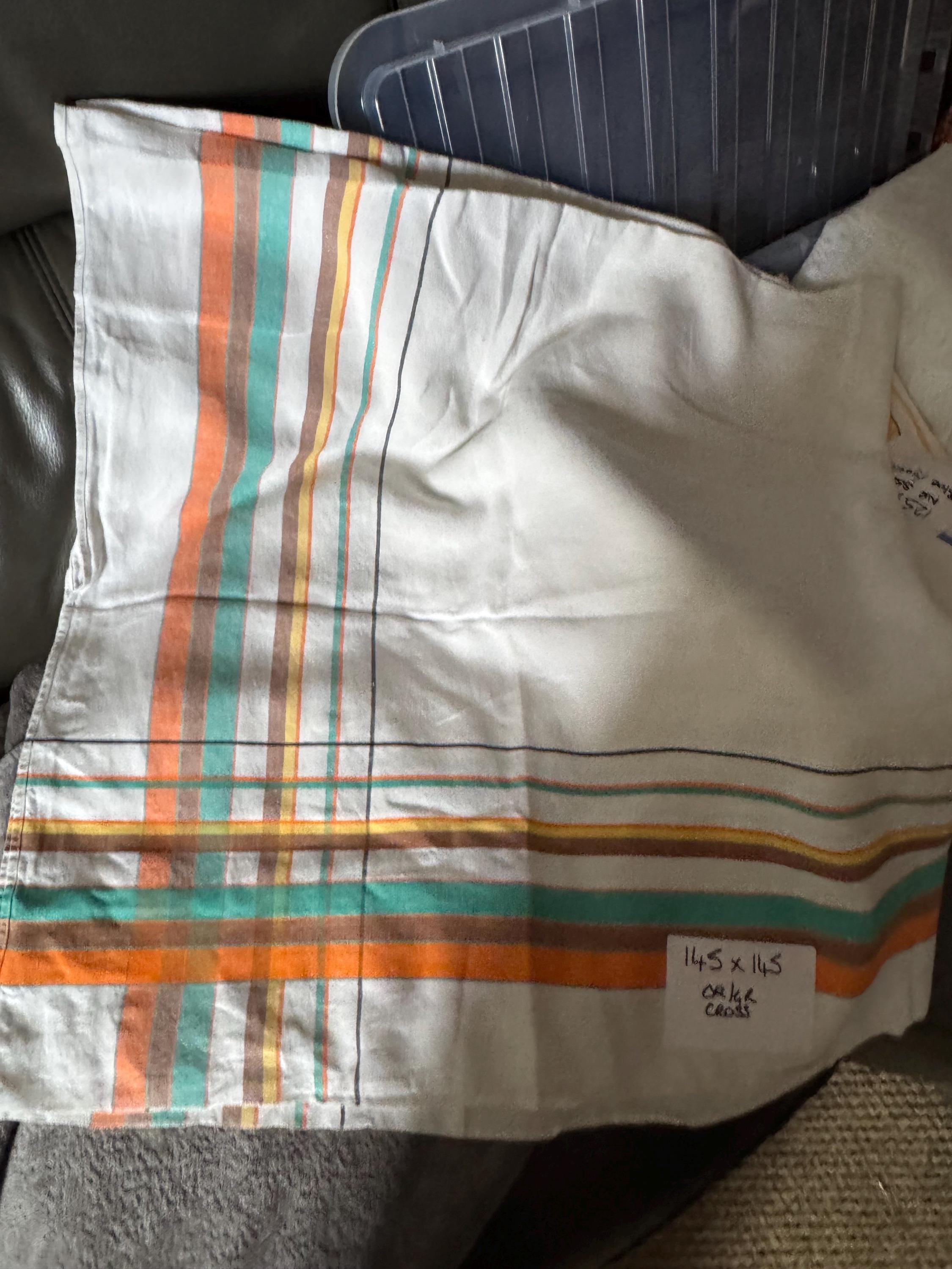 Large 145cm near square off white with orange brown green and yellow geometric stripes and check large printed tablecloth