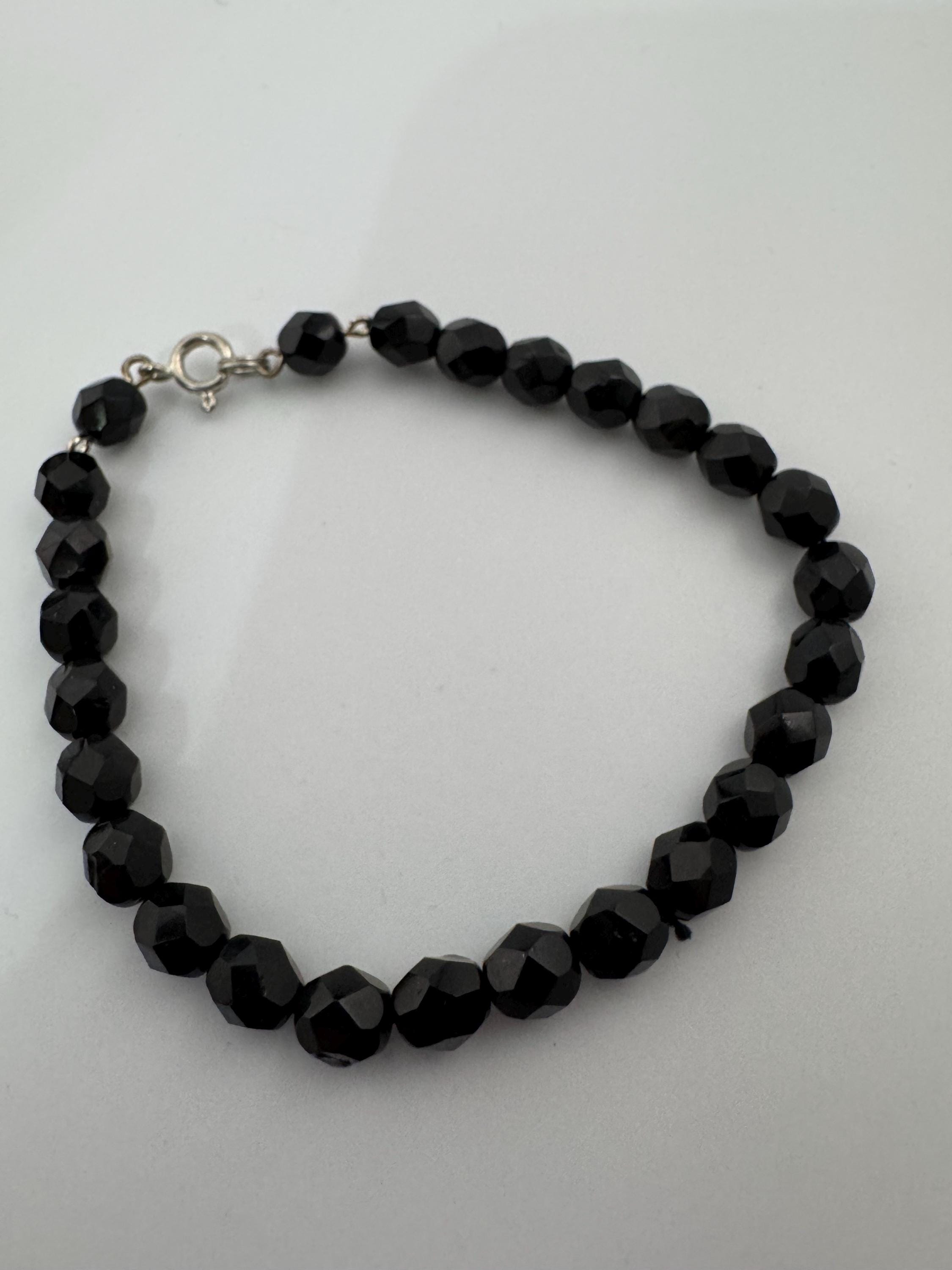 French jet glass black bead bracelet , 21cm price each