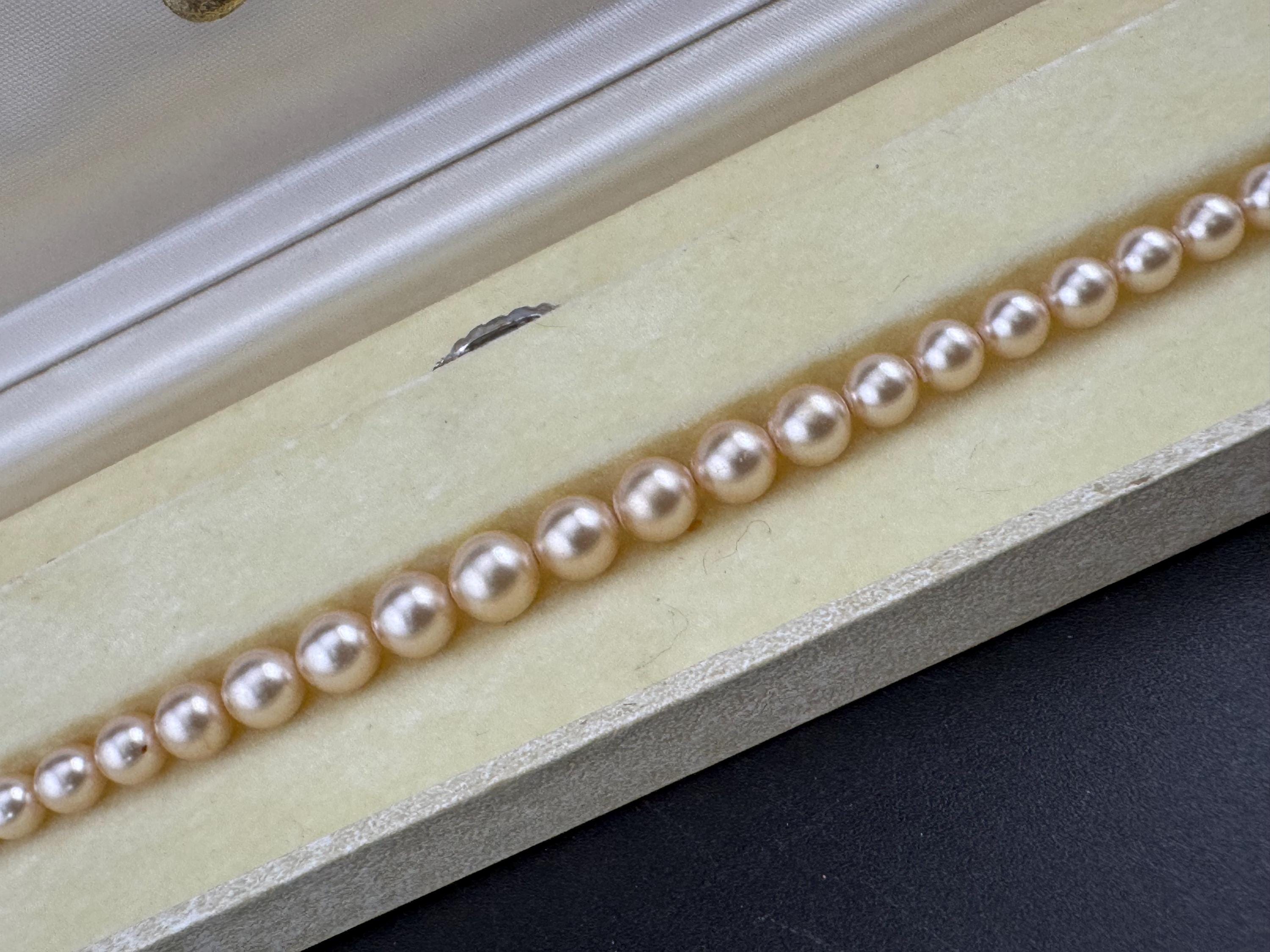 Lotus boxed vintage single strand cream glass knotted graduated pearl necklace silver plated clasp 46cm