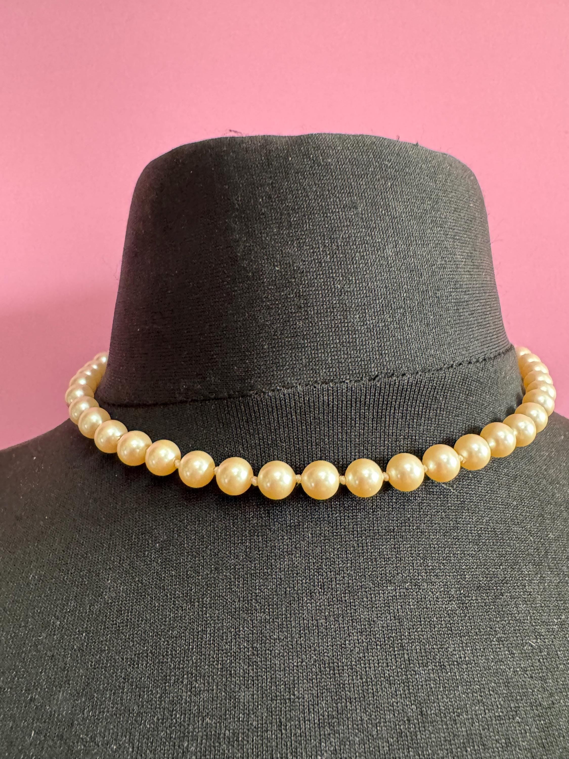 Signed Pierre Cardin Classic ivory glass pearl collar necklace, individually knotted beads 42cm gold tone