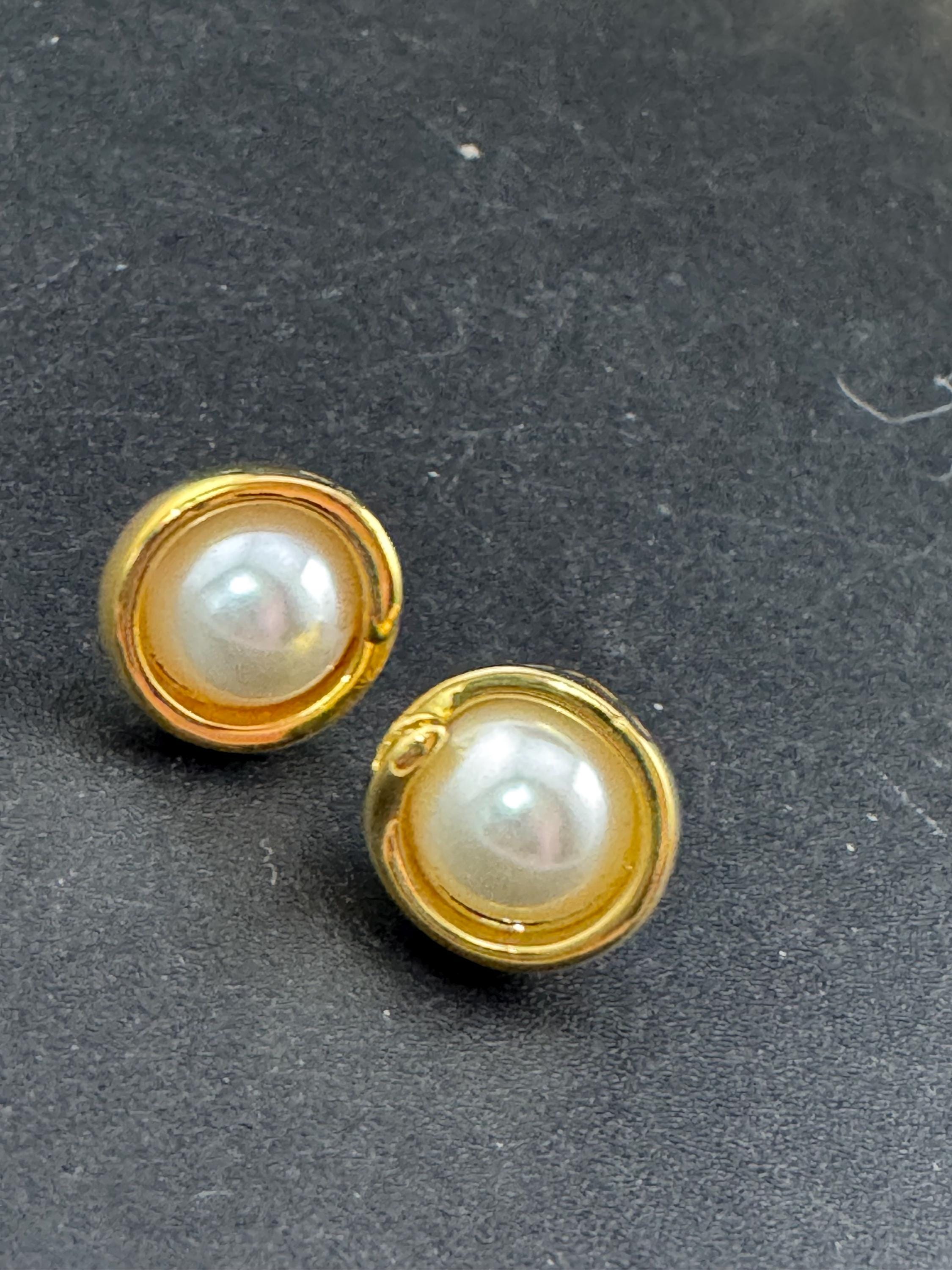 Vintage small dainty gold tone surround with modernist white faux pearl cabochon 12mm stud earrings for pierced ears