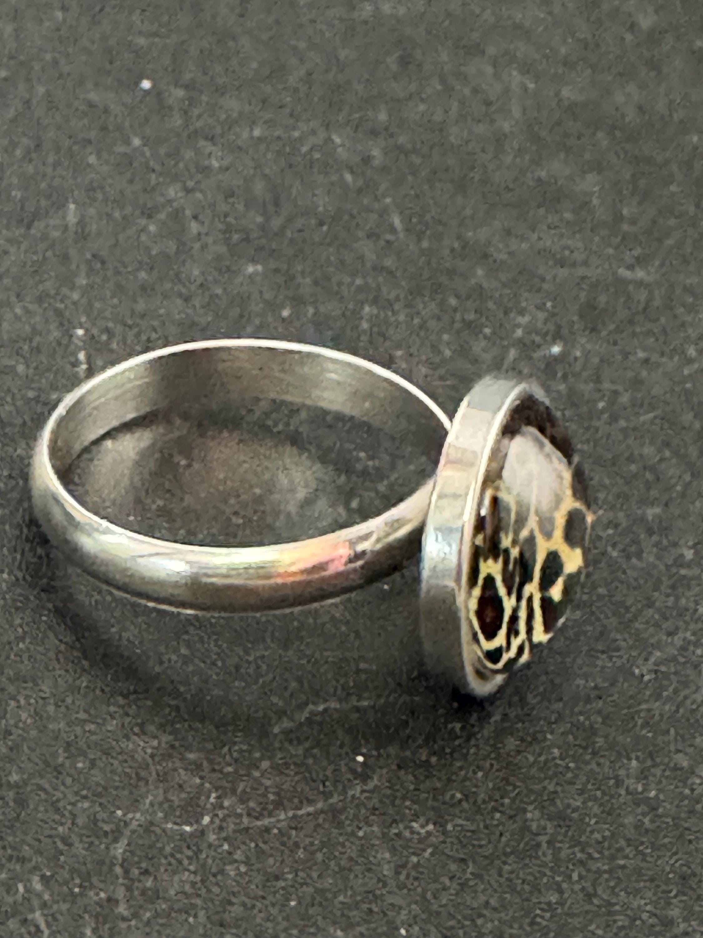 Adjustable 14mm bezel set Leopard print ring made from stainless steel, non Tarnish with a glass cabochon