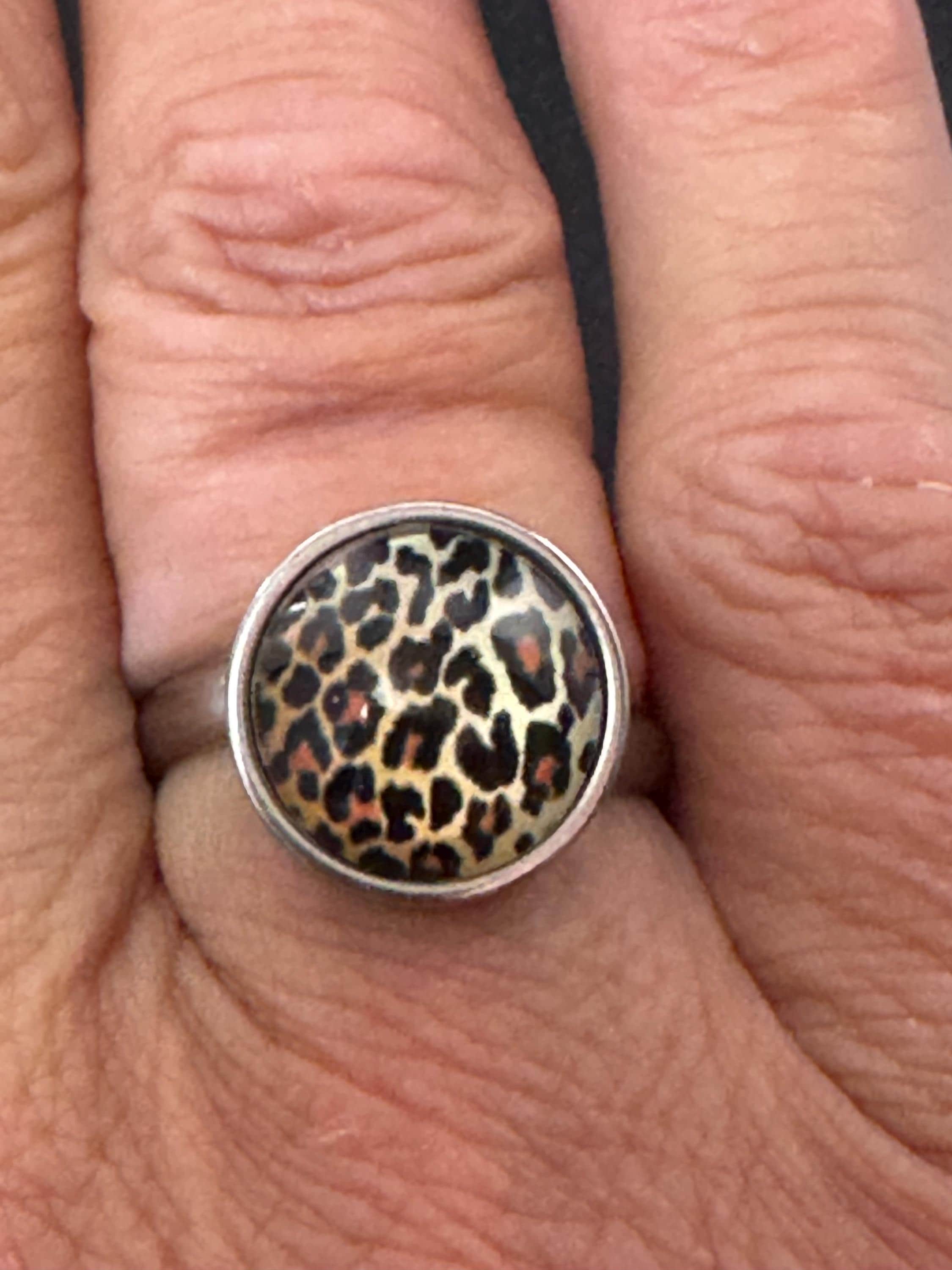 Adjustable 14mm bezel set Leopard print ring made from stainless steel, non Tarnish with a glass cabochon