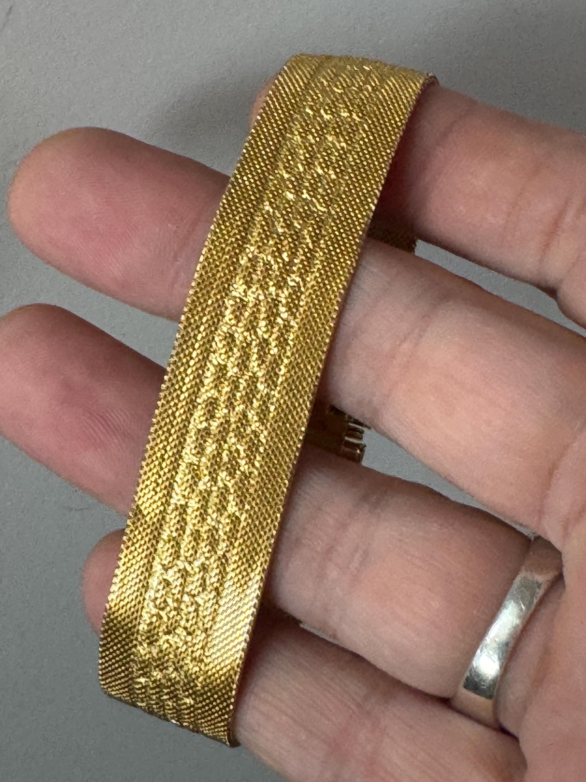 1970s geometric design bright gold plated articulated flat wide mesh bracelet with safety chain