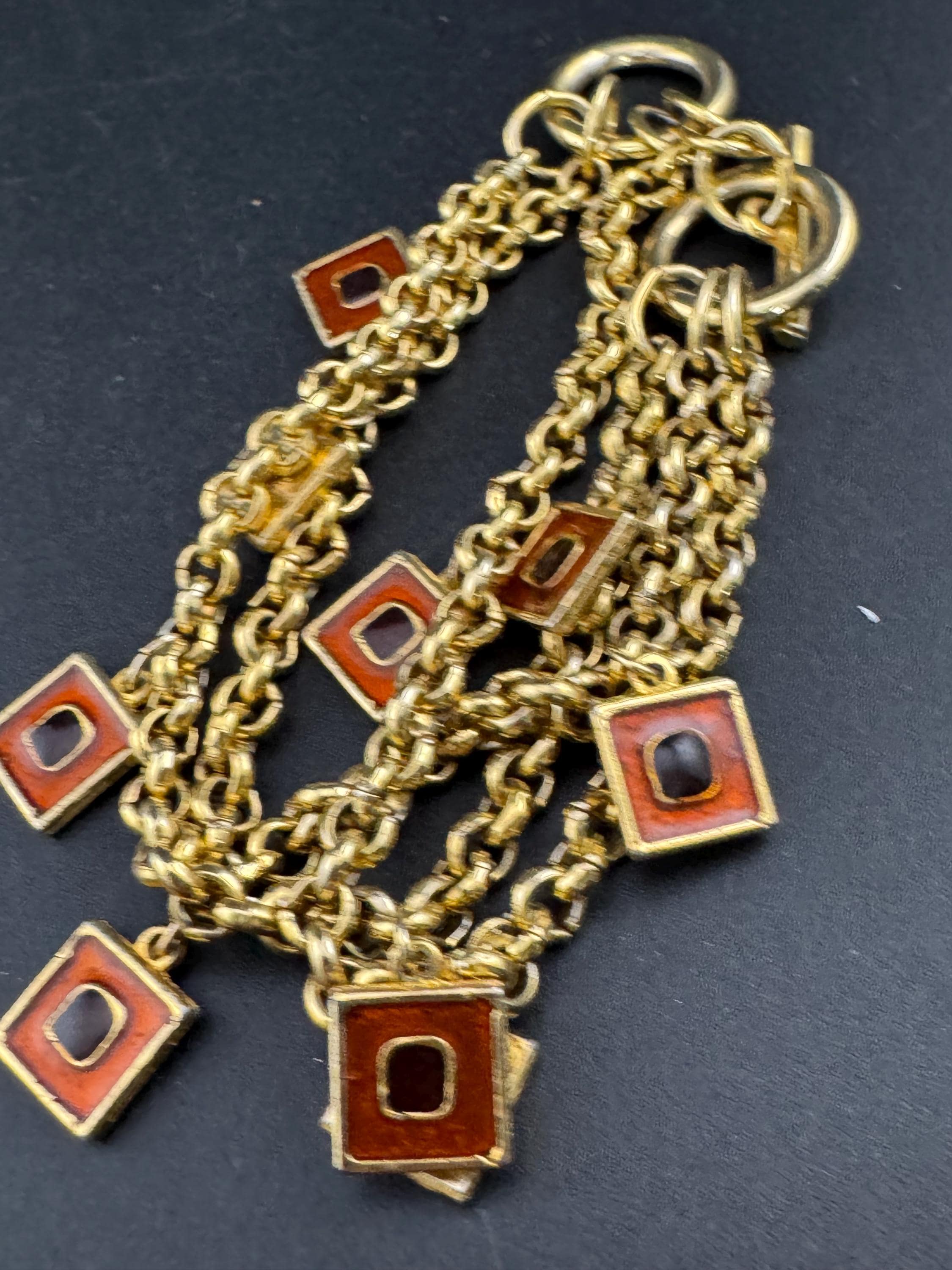 Vintage high end orange and black enamel chain link statement Multistrand charm bracelet gold tone unsigned