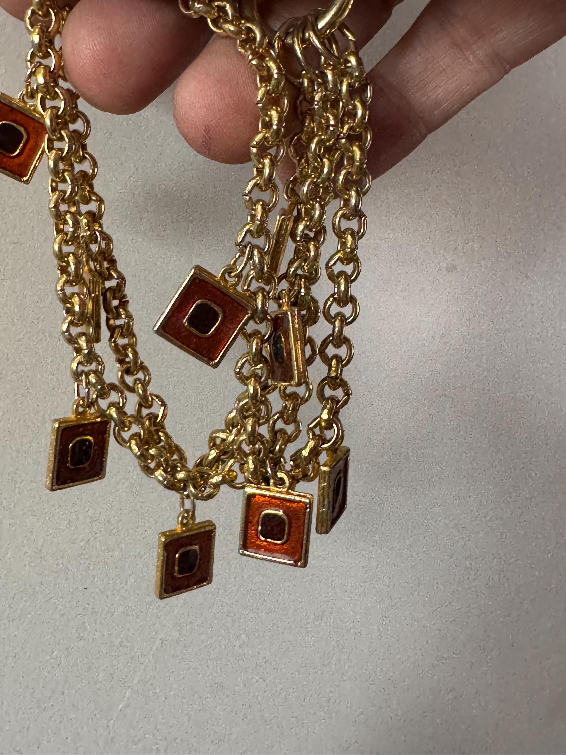 Vintage high end orange and black enamel chain link statement Multistrand charm bracelet gold tone unsigned