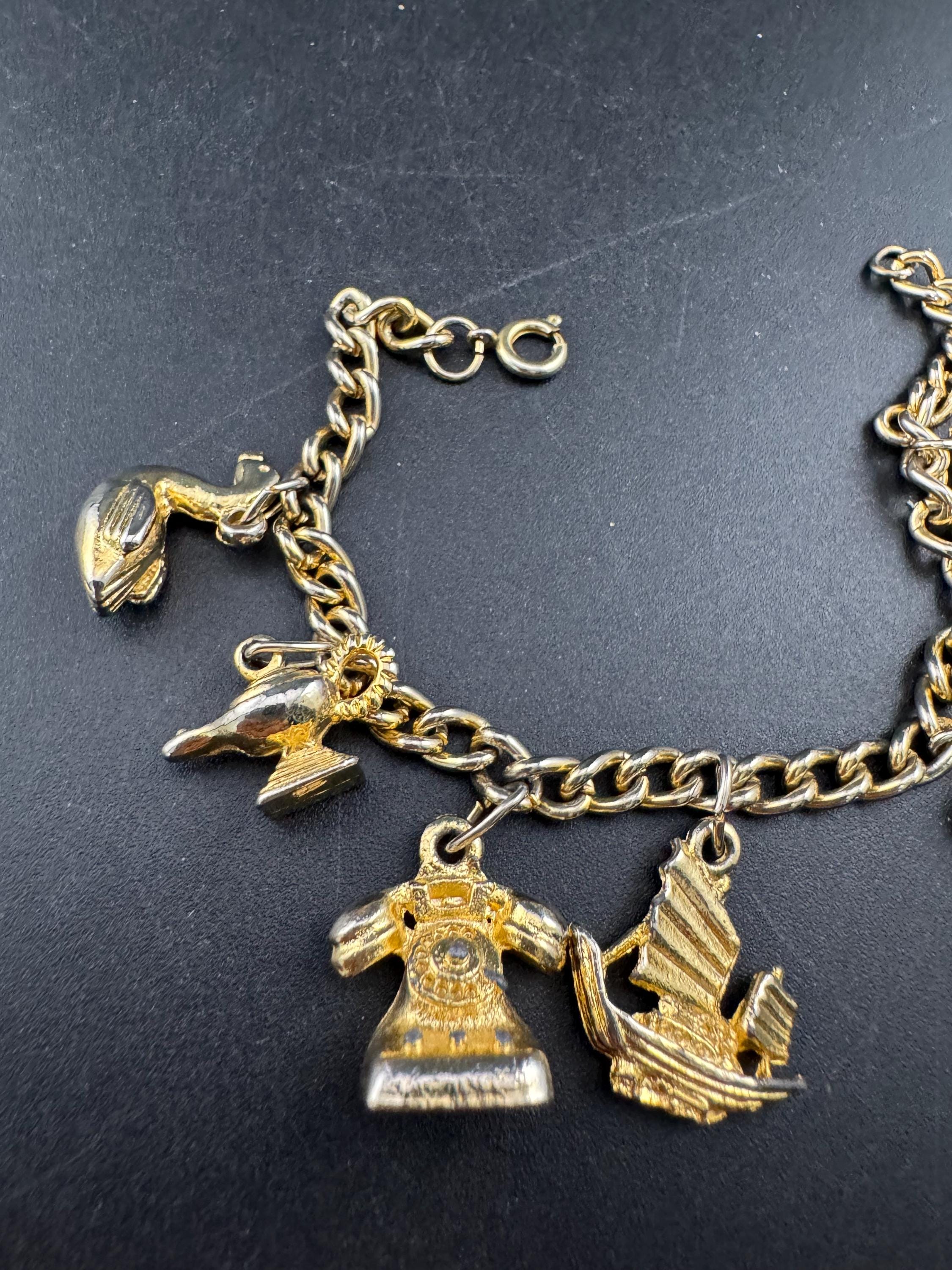 Vintage retro Gold tone chain link charm bracelet windmill seahorse lamp boat lantern telephone 19cm long